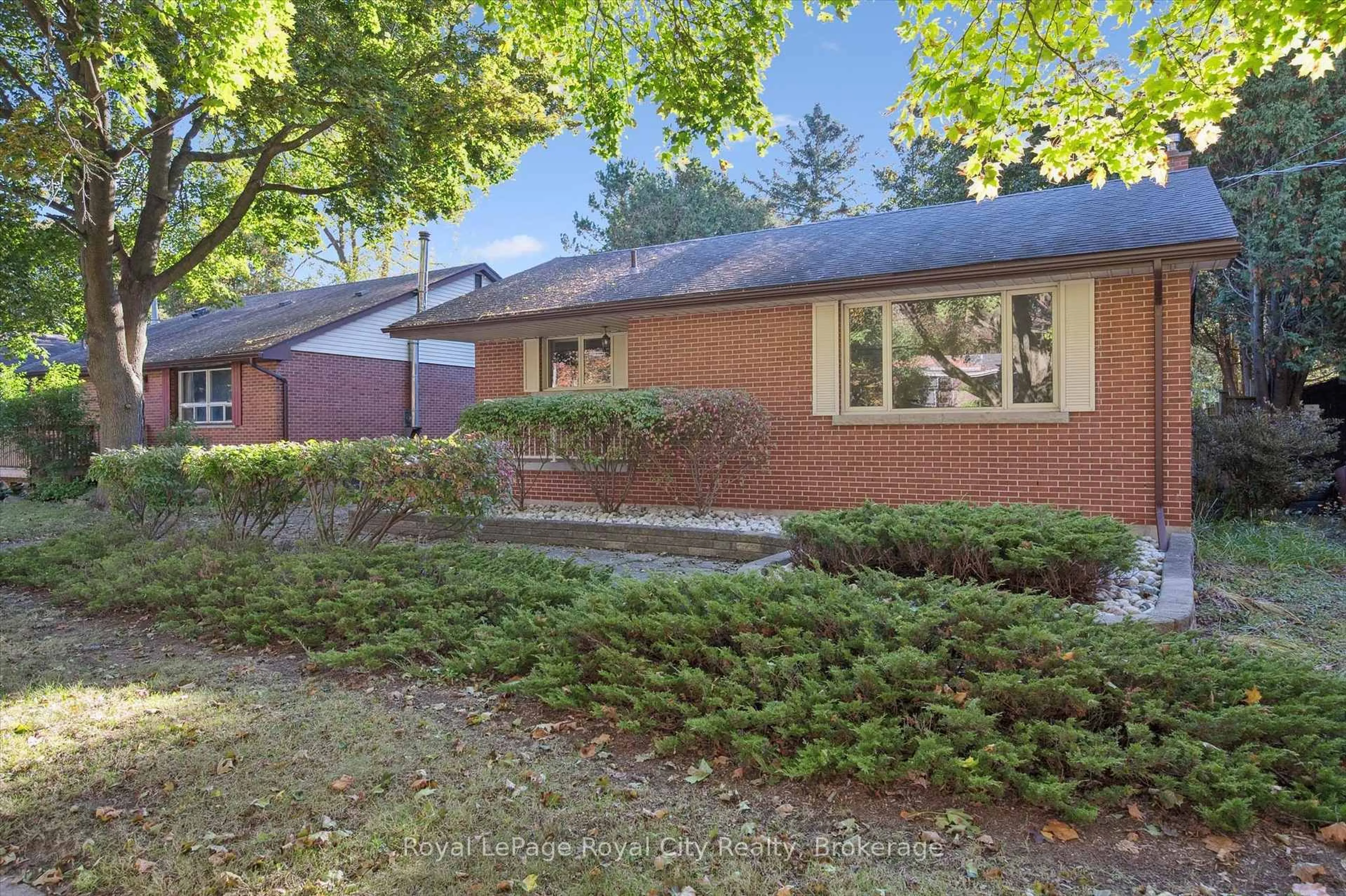 Home with brick exterior material, street for 228 Water St, Guelph Ontario N1G 1B2