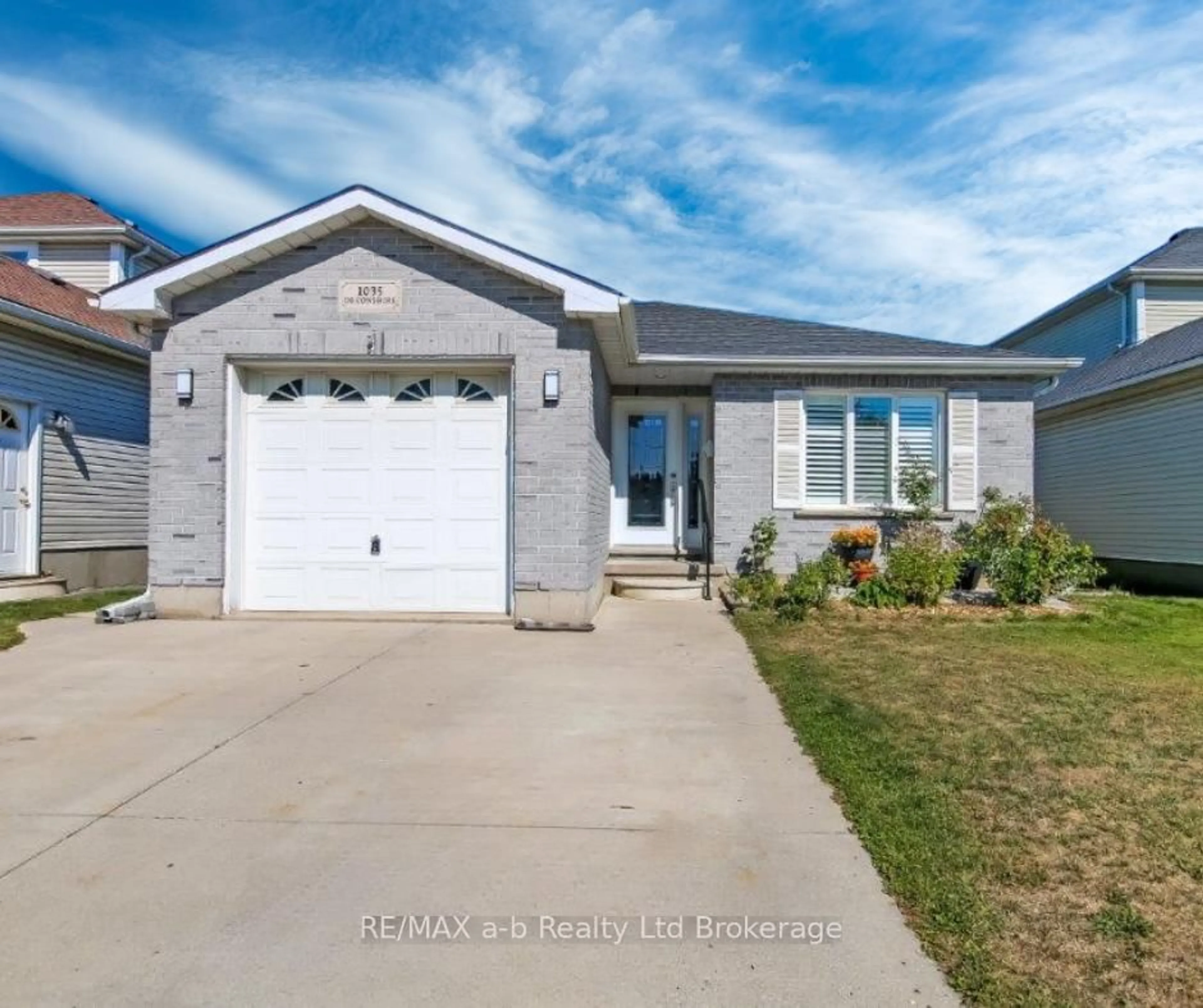 Home with brick exterior material, street for 1035 Devonshire Ave, Woodstock Ontario N4S 5S1