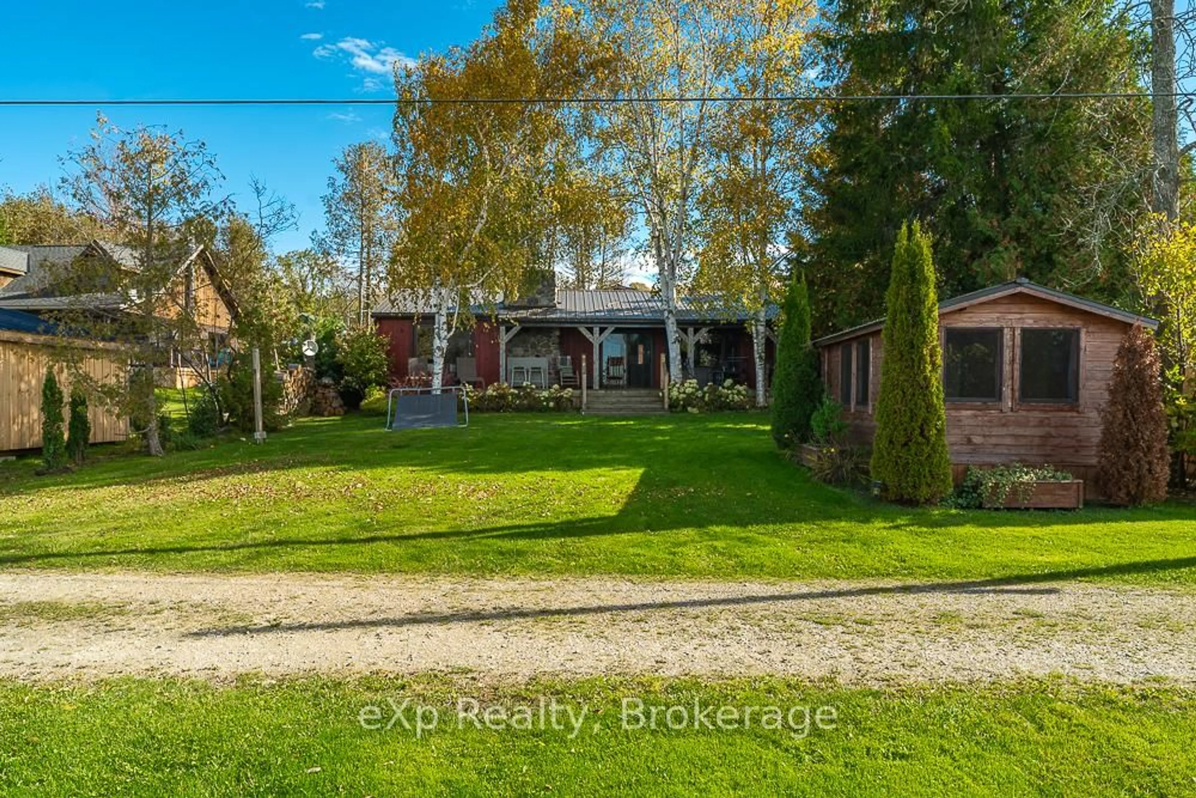 A pic from outside/outdoor area/front of a property/back of a property/a pic from drone, street for 111 Wilson Dr, Georgian Bluffs Ontario N0H 2T0