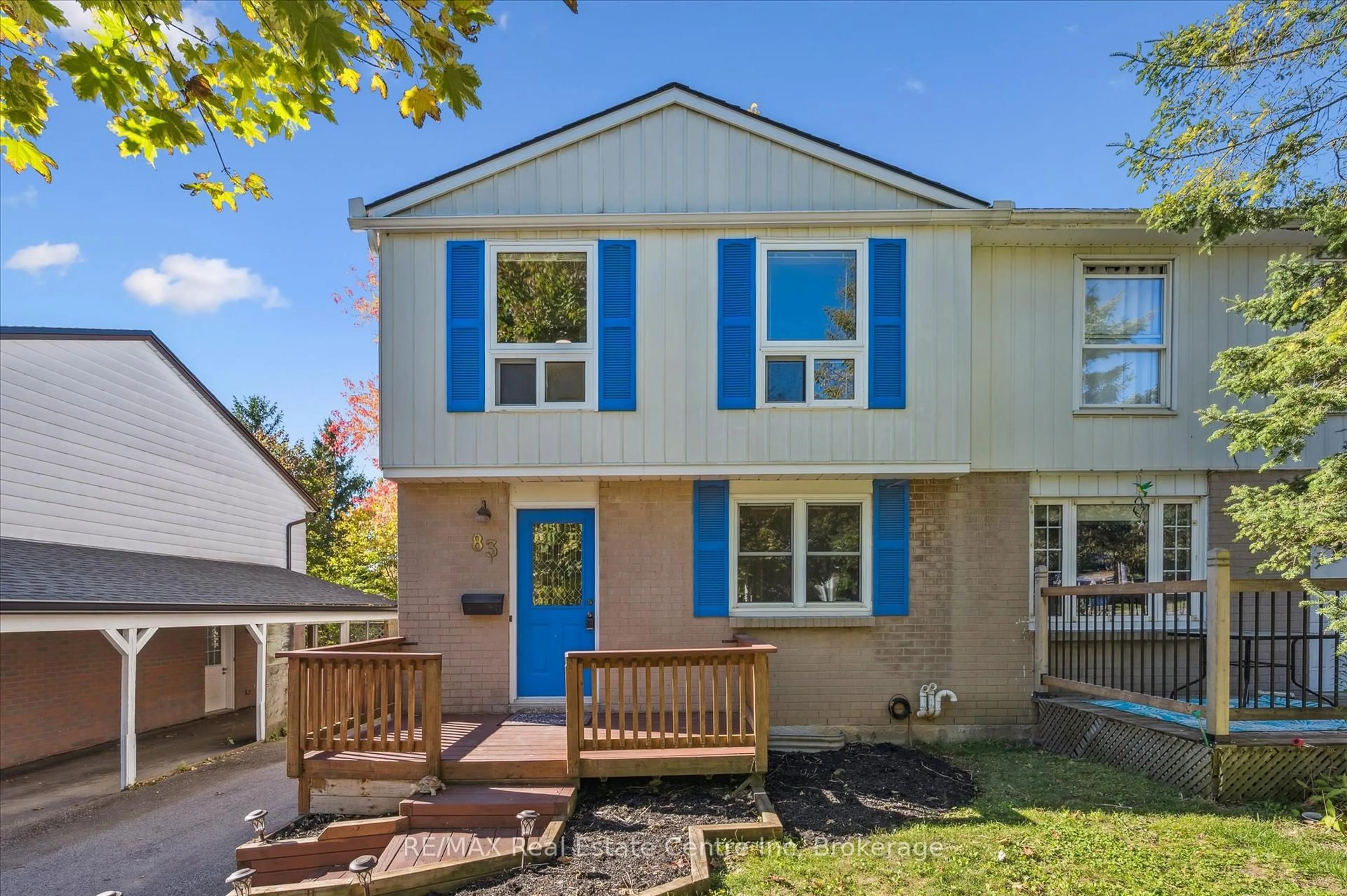 Home with vinyl exterior material, street for 83 Hadati Rd, Guelph Ontario N1E 6G9
