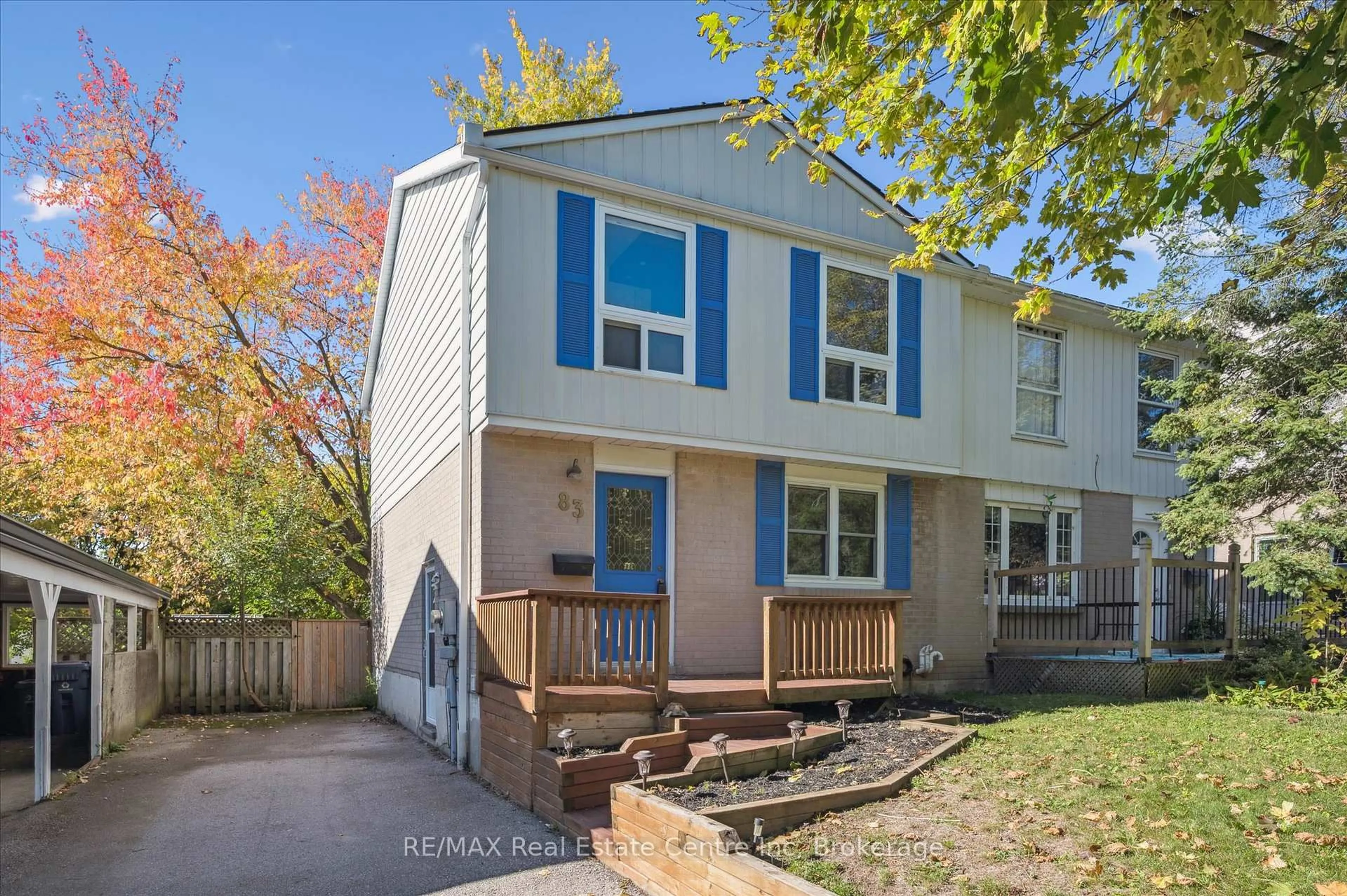 Home with vinyl exterior material, street for 83 Hadati Rd, Guelph Ontario N1E 6G9