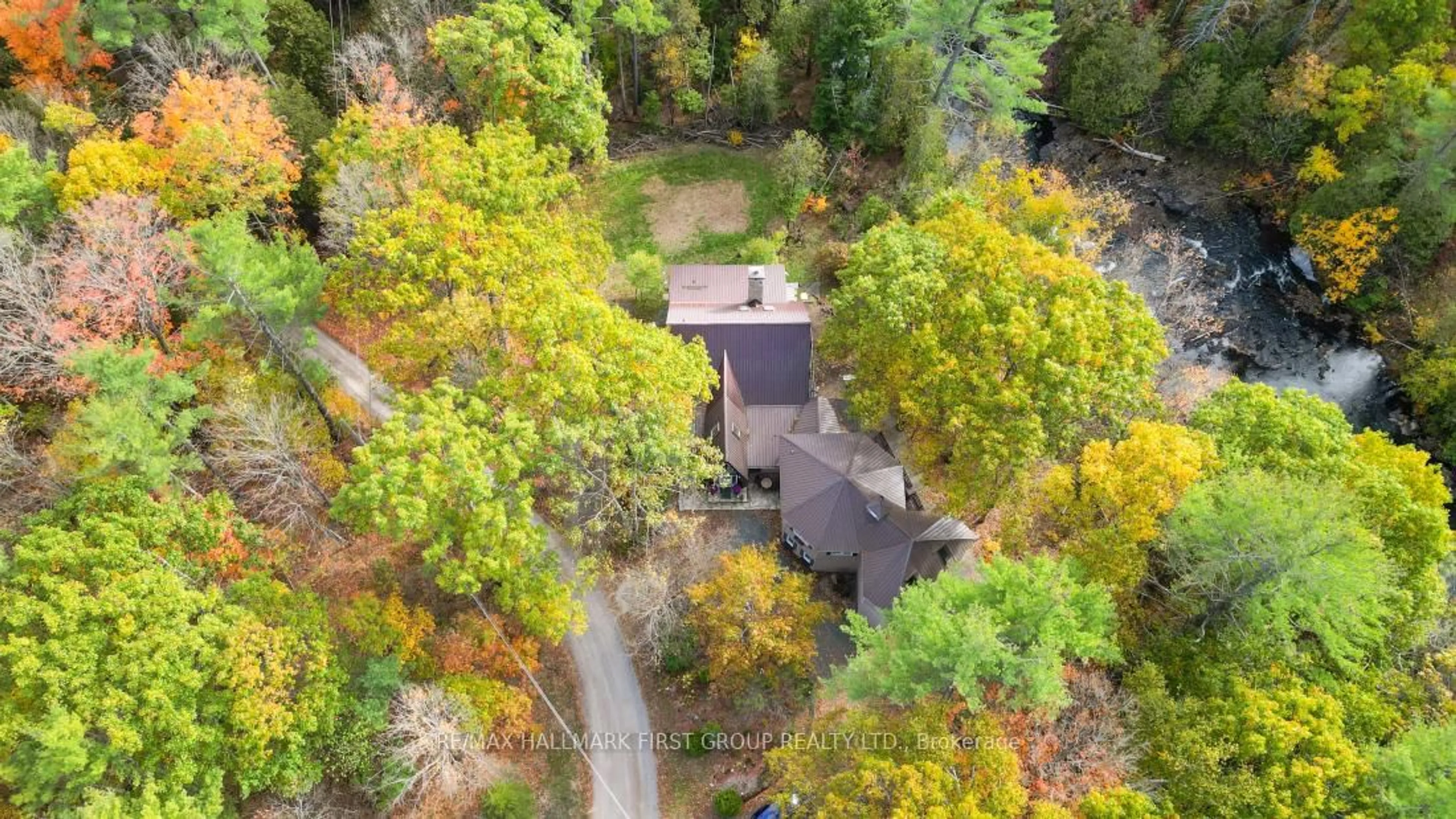 A pic from outside/outdoor area/front of a property/back of a property/a pic from drone, forest/trees view for 74 Cottage Lane, Tweed Ontario K0K 3J0
