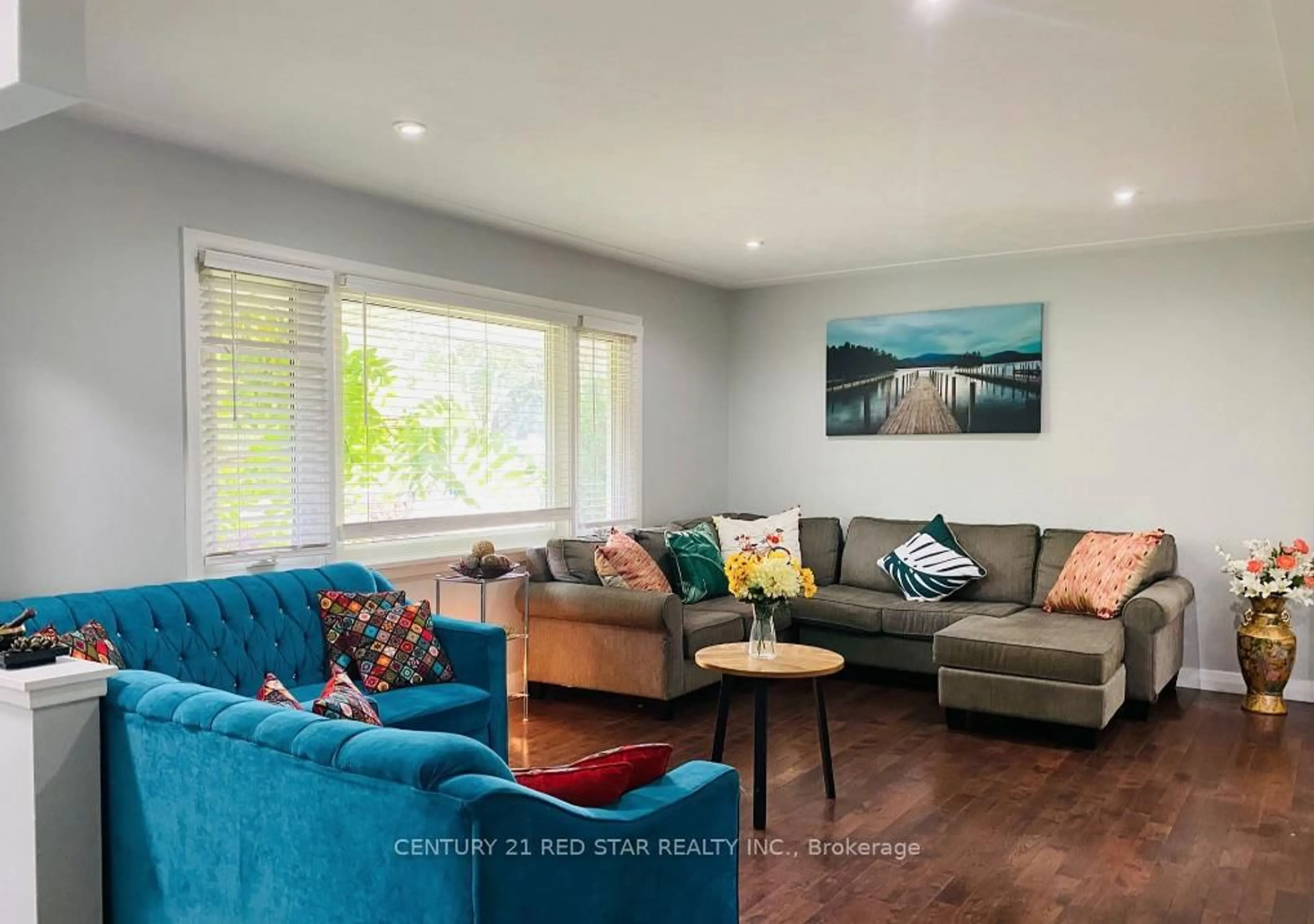 Living room with furniture, wood/laminate floor for 107 Ellis Cres, Waterloo Ontario N2J 2C1