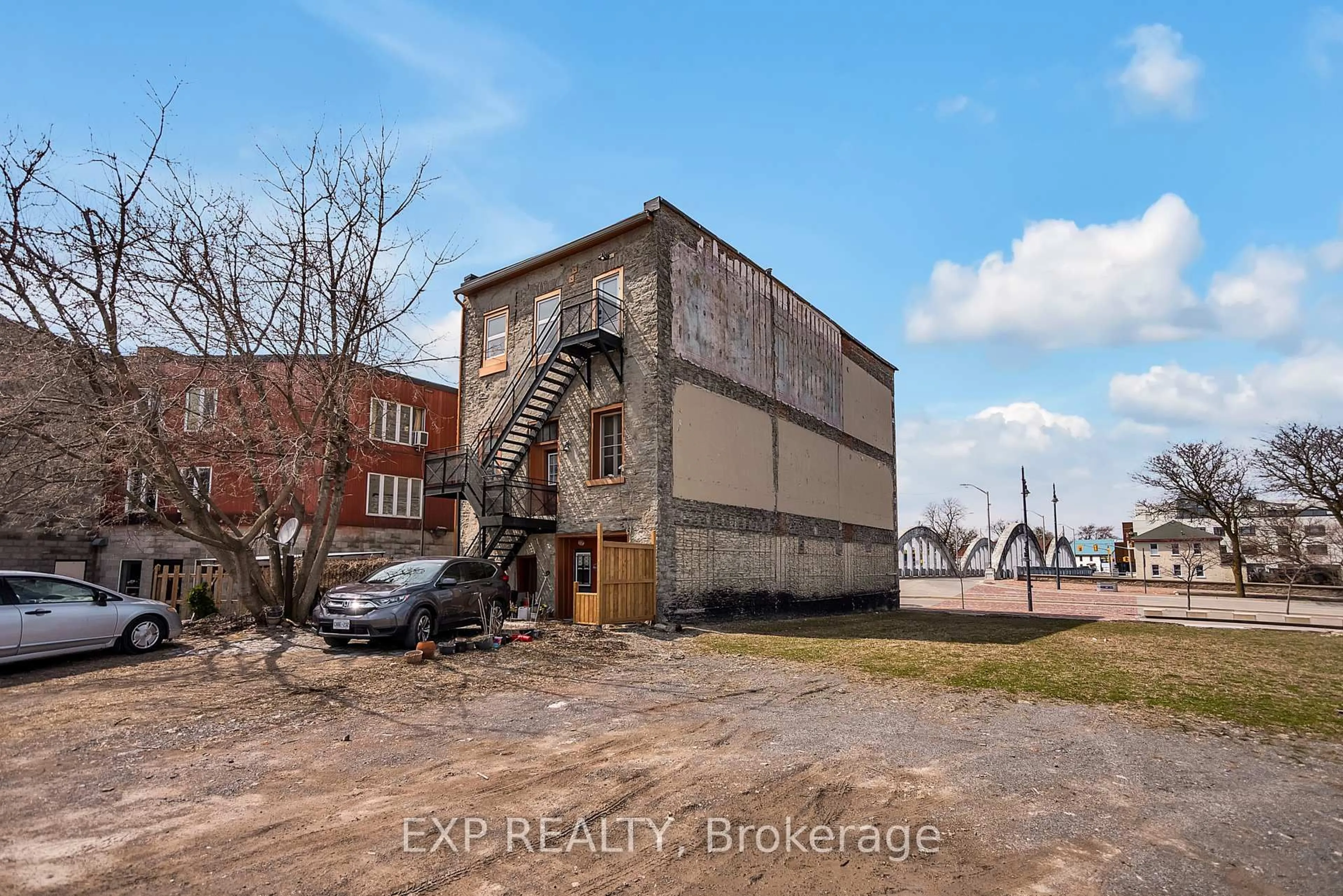 A pic from outside/outdoor area/front of a property/back of a property/a pic from drone, building for 393 Front St #1, Belleville Ontario K8N 2Z9