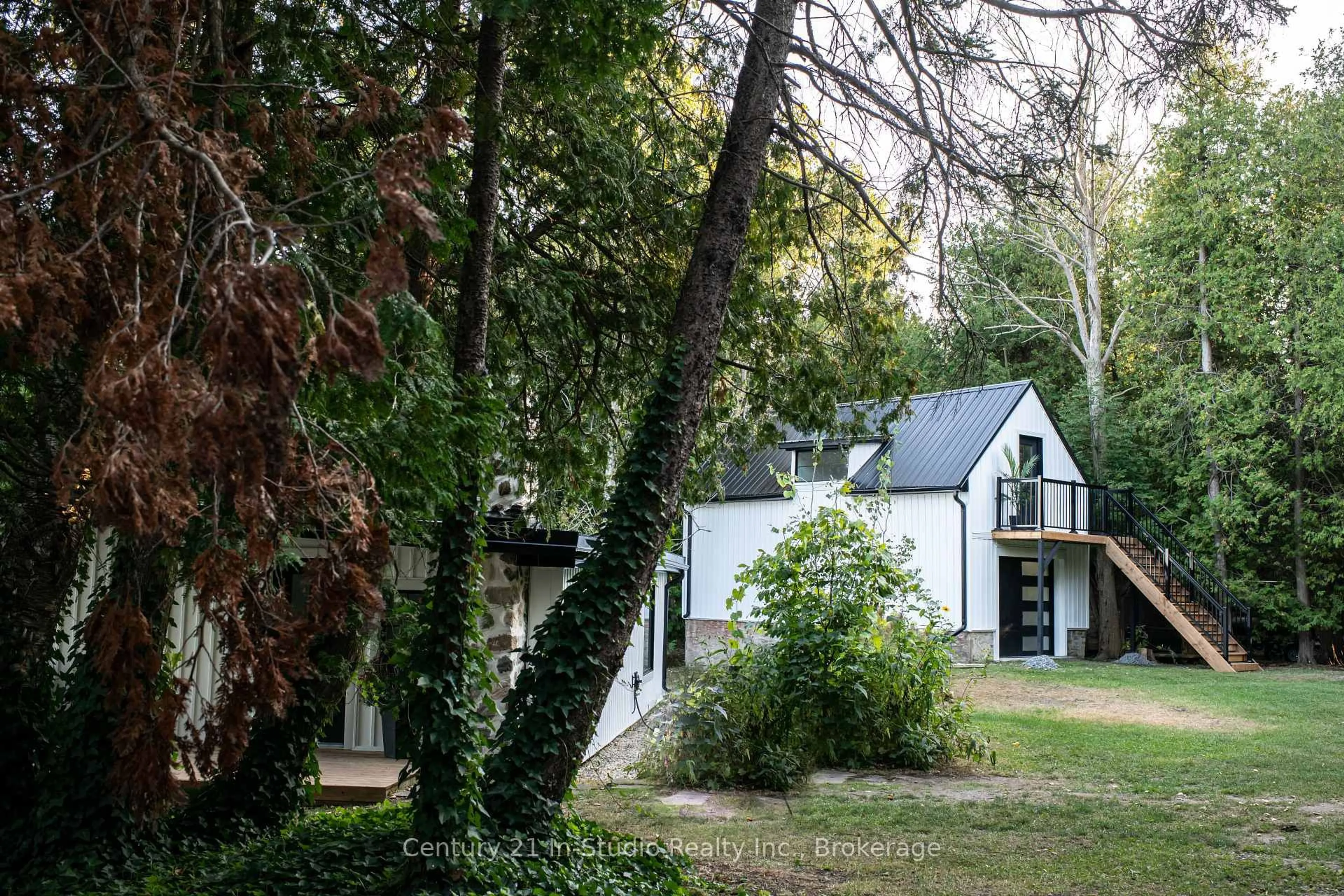 A pic from outside/outdoor area/front of a property/back of a property/a pic from drone, unknown for 193 Tamarac Rd, Northern Bruce Peninsula Ontario N0H 1W0