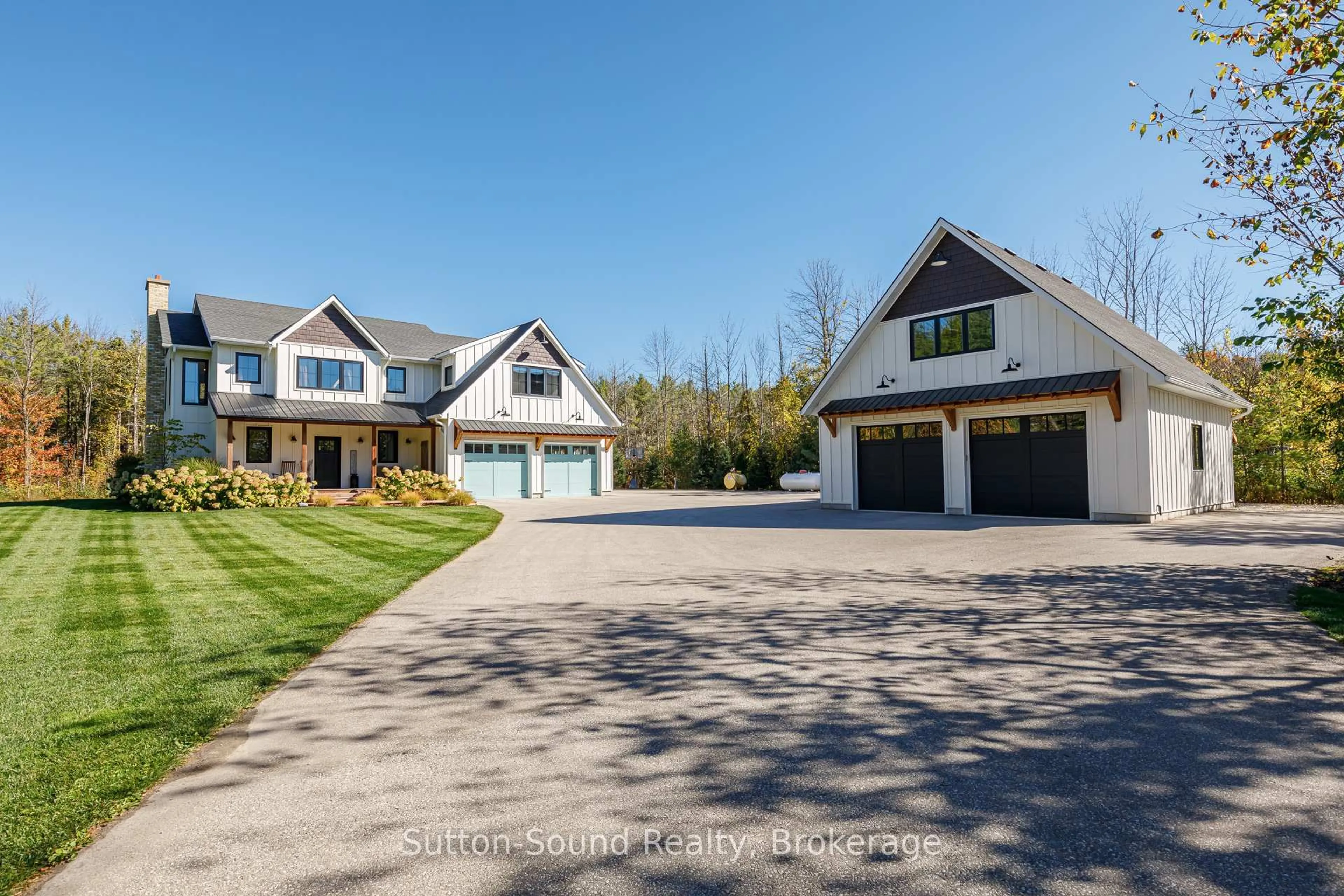 A pic from outside/outdoor area/front of a property/back of a property/a pic from drone, street for 303277 33 Sdrd, Meaford Ontario N0H 1B0