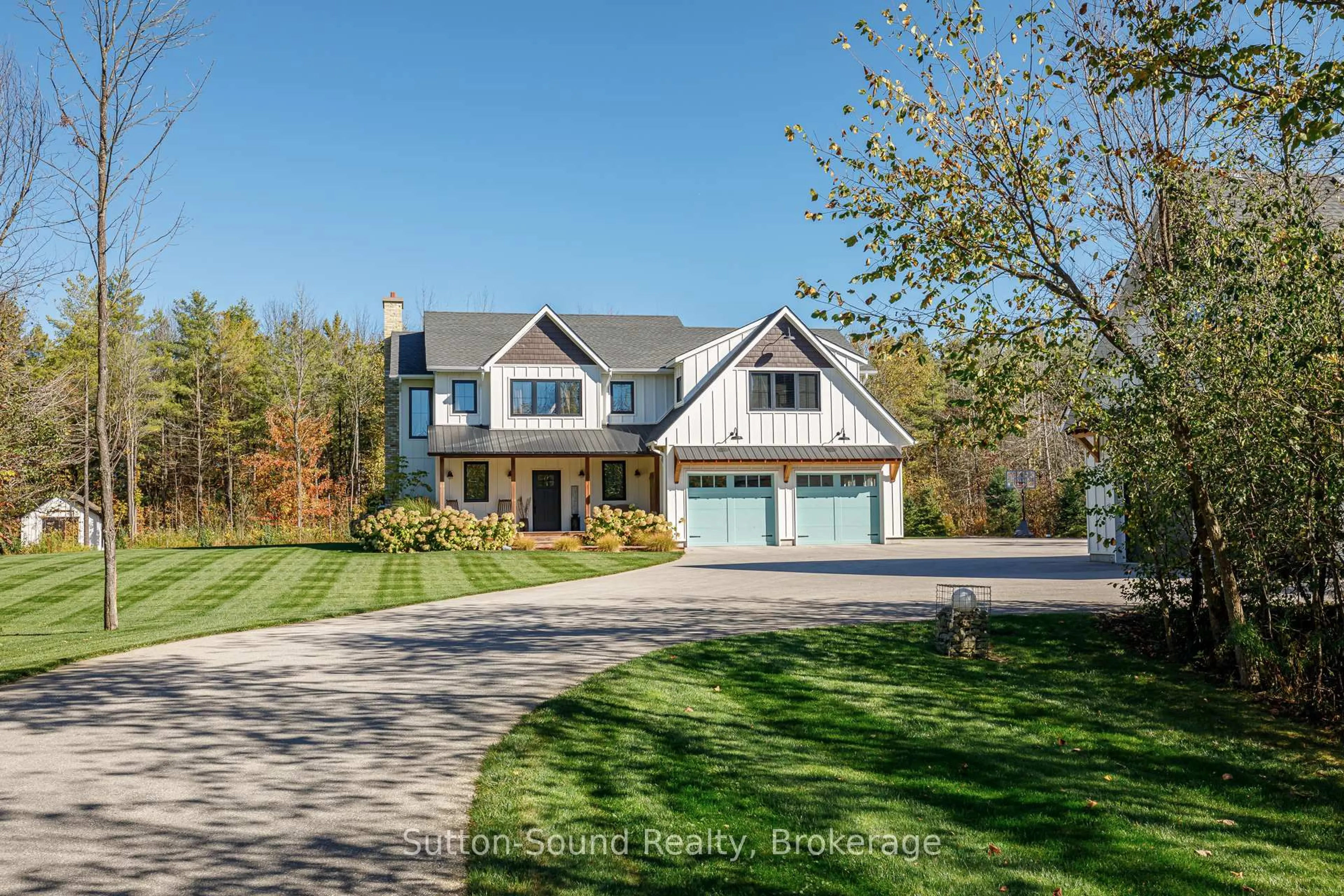 A pic from outside/outdoor area/front of a property/back of a property/a pic from drone, unknown for 303277 33 Sdrd, Meaford Ontario N0H 1B0