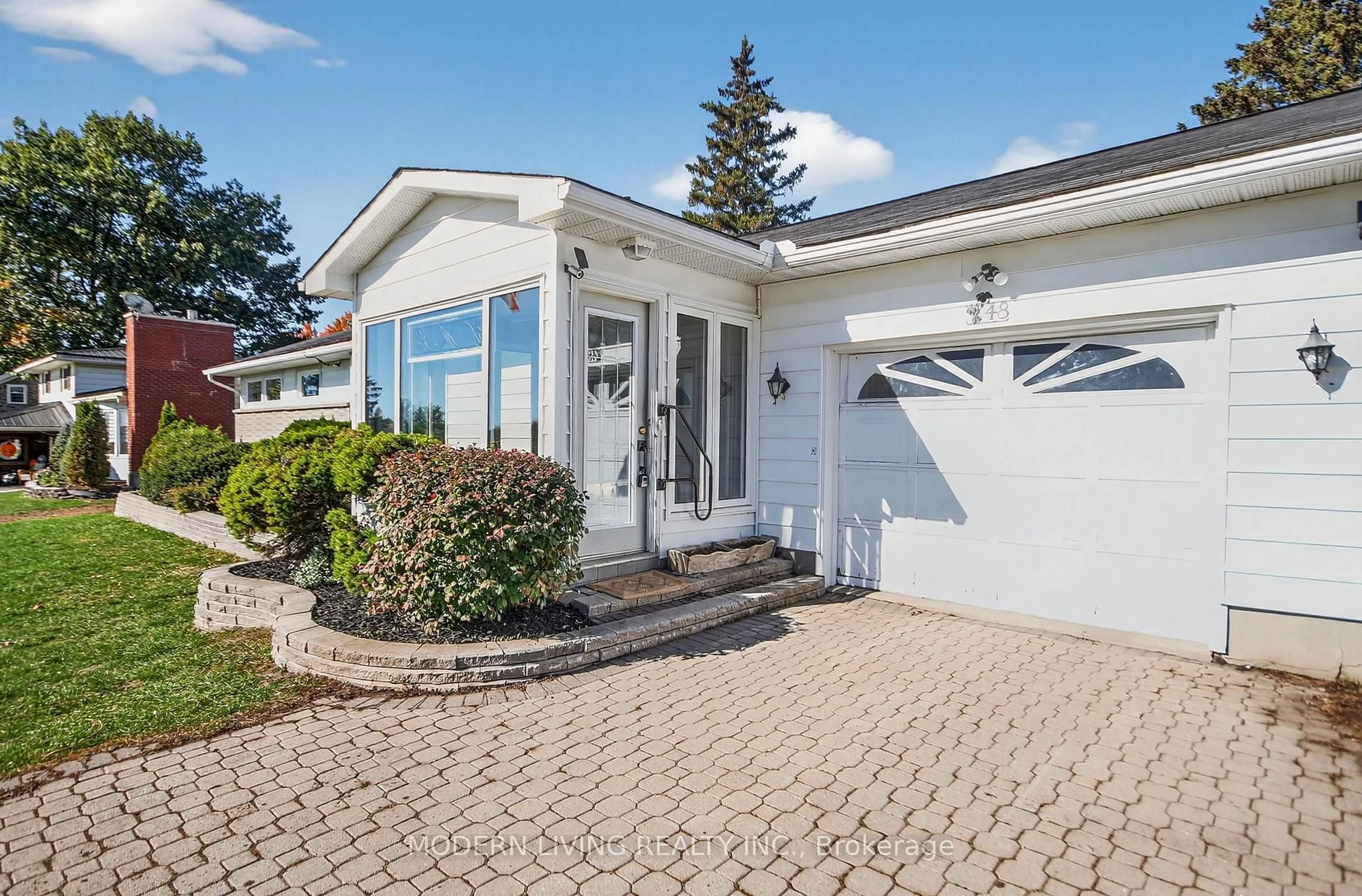 Home with vinyl exterior material, street for 48 Elizabeth Dr, South Dundas Ontario K0E 1K0