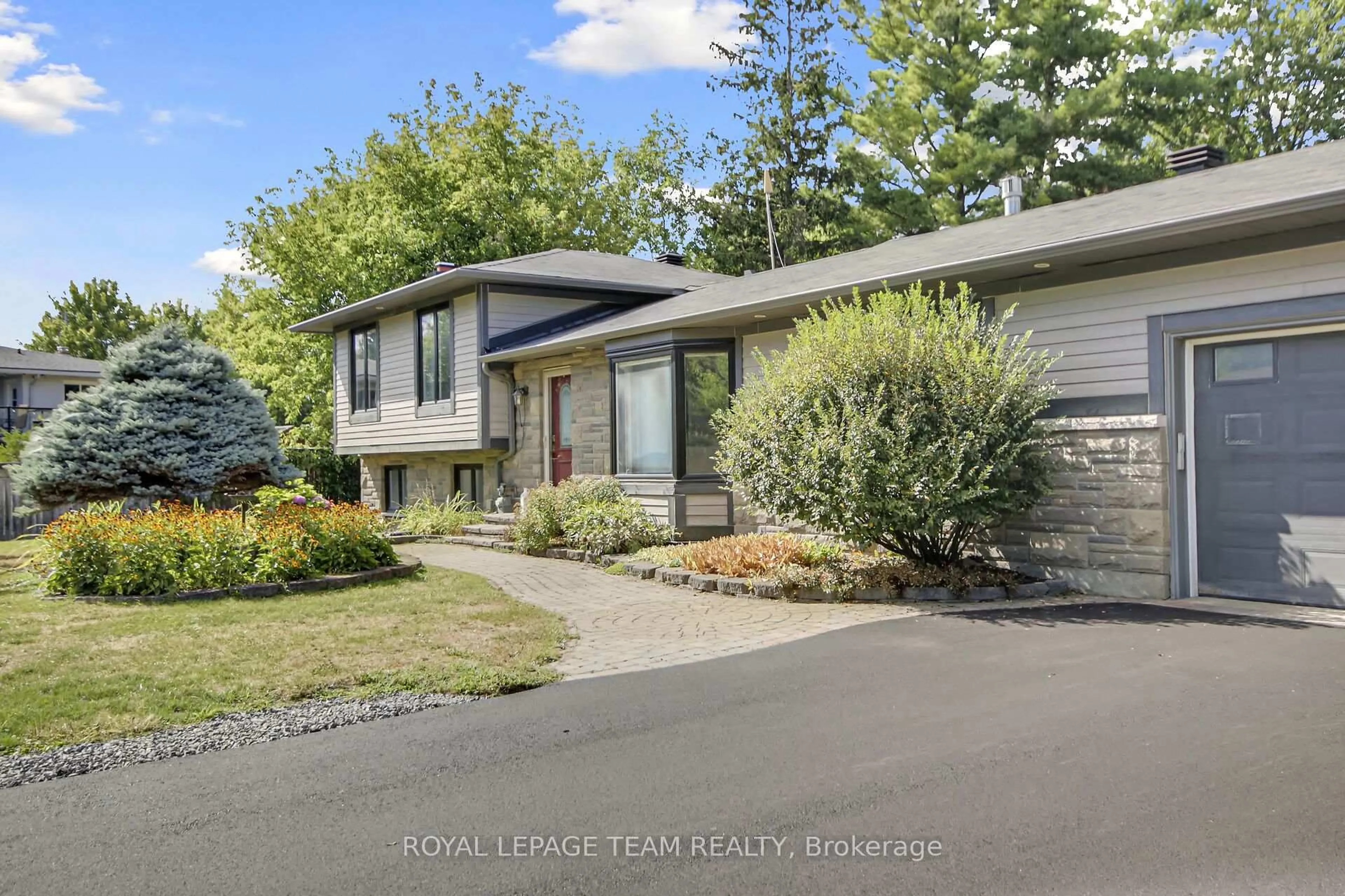 Home with vinyl exterior material, street for 1079 Christopher Dr, Ottawa Ontario K4M 1J2