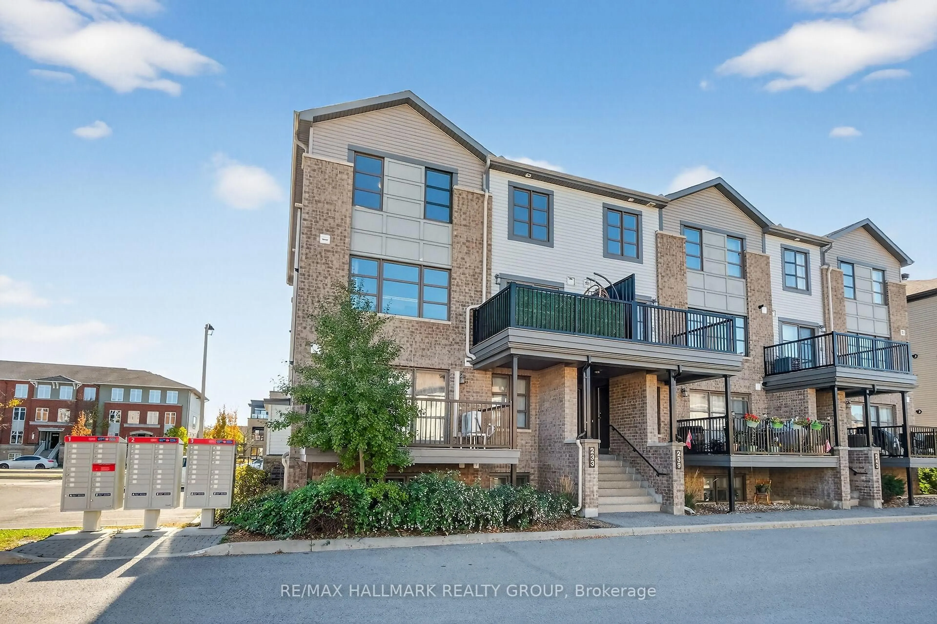 A pic from outside/outdoor area/front of a property/back of a property/a pic from drone, unknown for 235 Infusion Private #22, Ottawa Ontario K2J 5X2