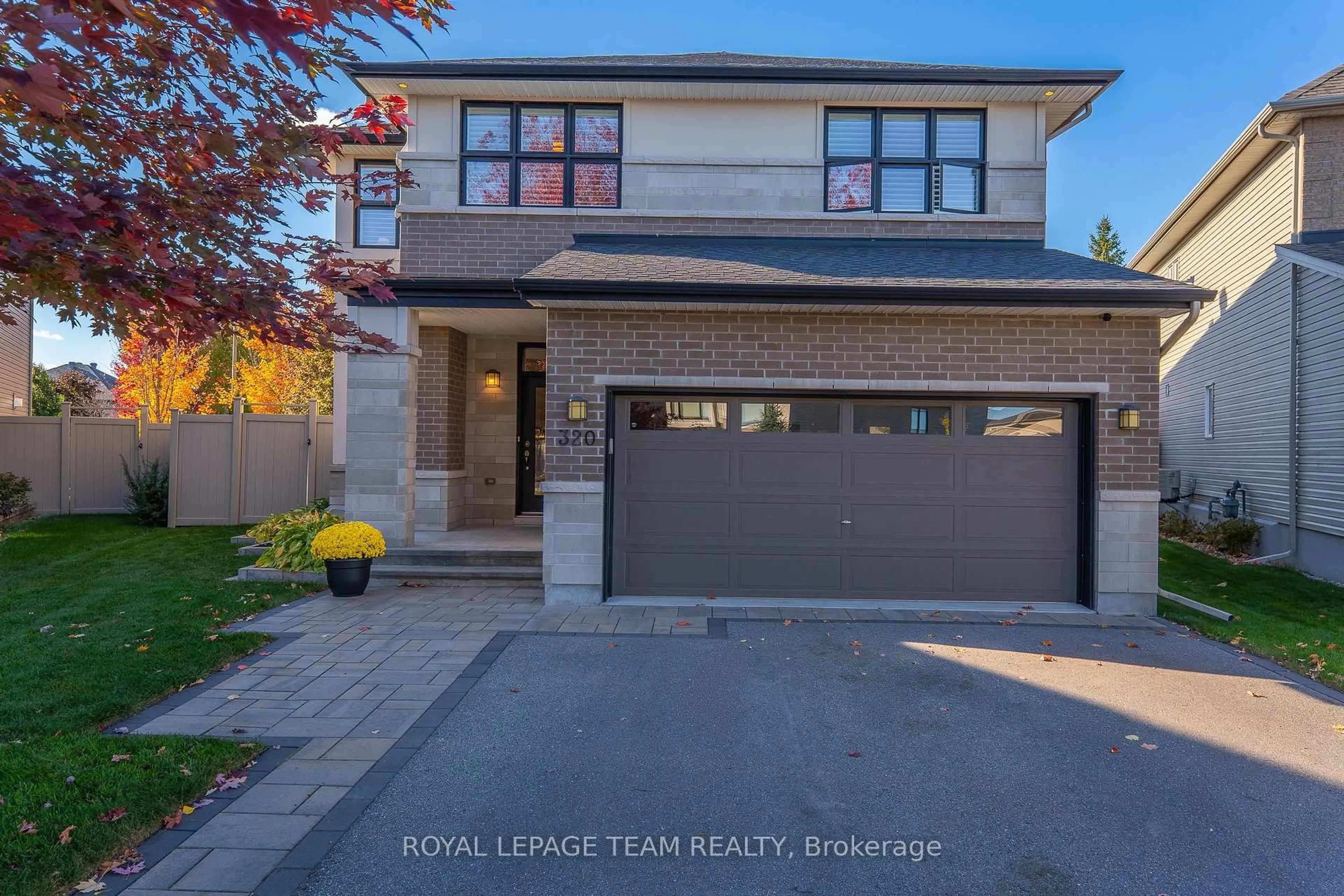 Home with brick exterior material, street for 320 Sugar Pine Cres, Kanata Ontario K2M 0B1