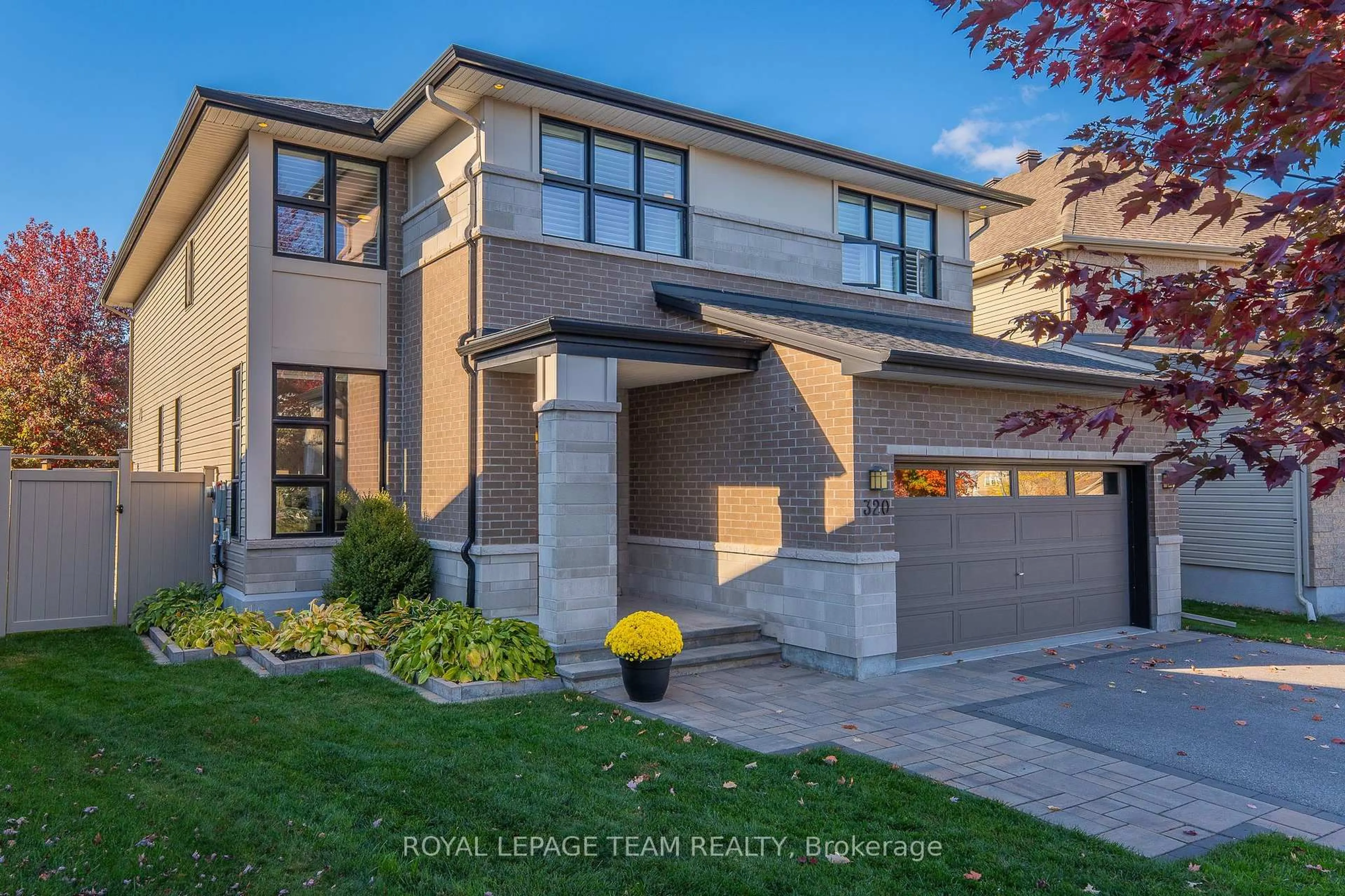Home with brick exterior material, street for 320 Sugar Pine Cres, Kanata Ontario K2M 0B1