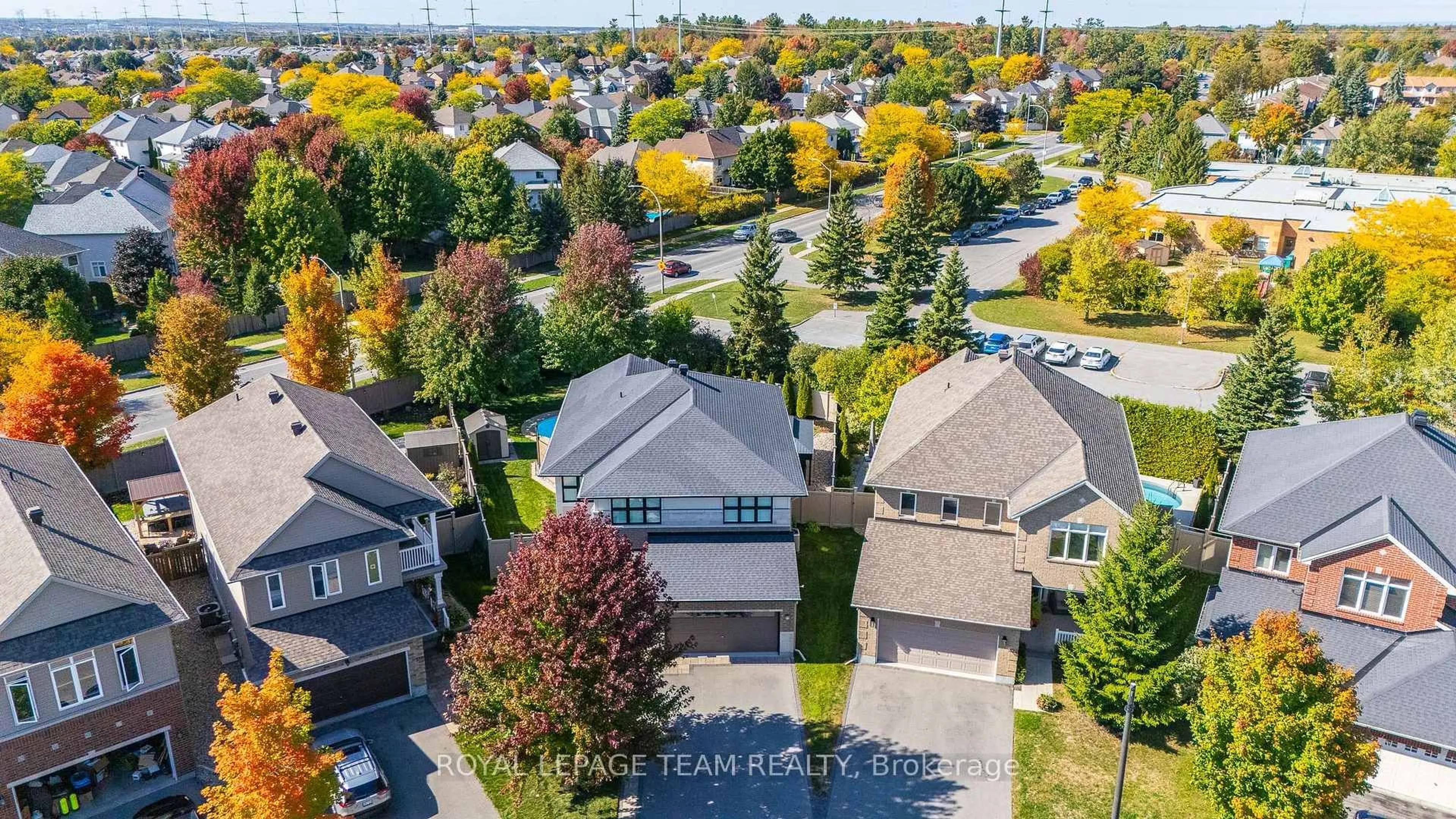 A pic from outside/outdoor area/front of a property/back of a property/a pic from drone, street for 320 Sugar Pine Cres, Kanata Ontario K2M 0B1