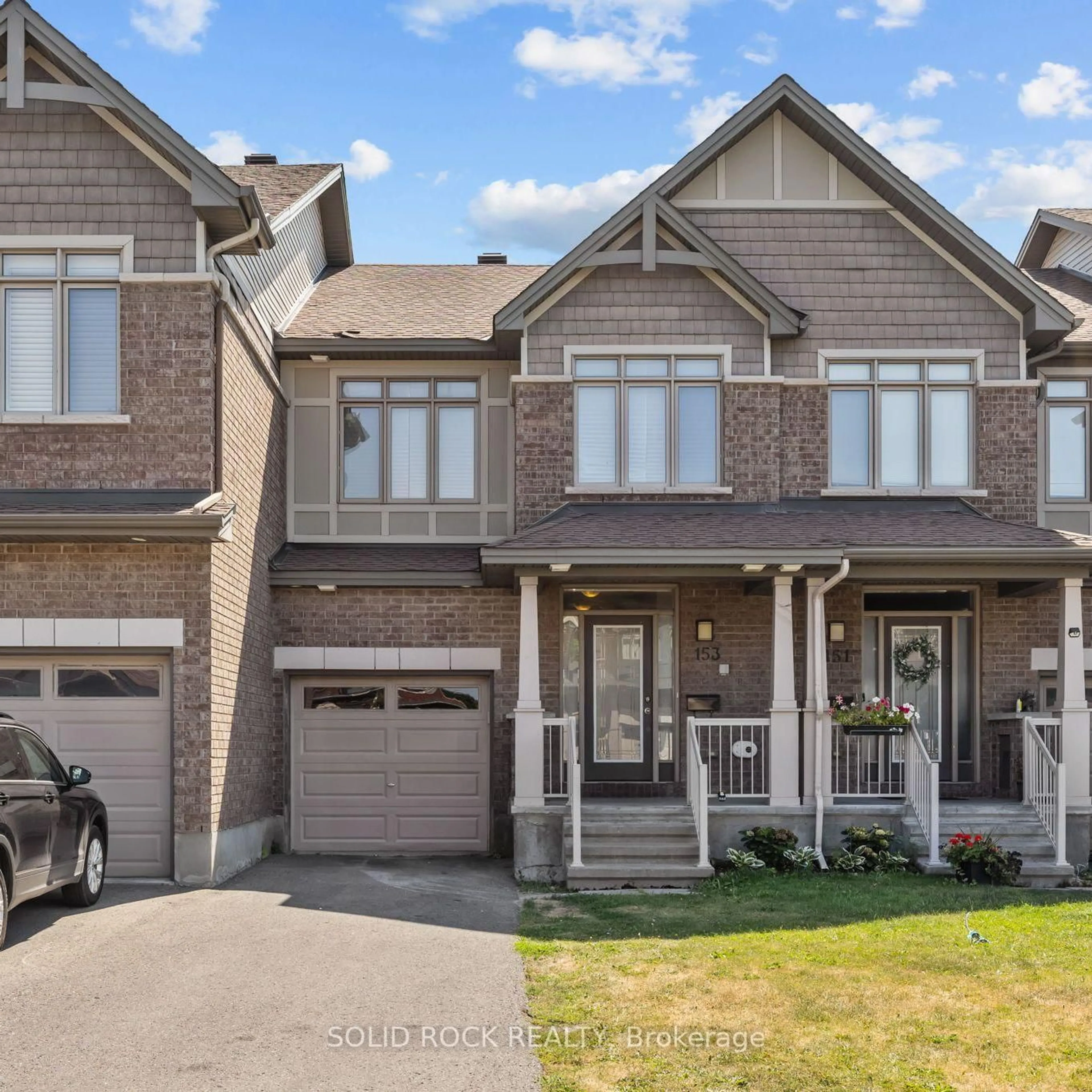 Home with brick exterior material, street for 153 Hawkshaw Cres, Ottawa Ontario K2J 5P8