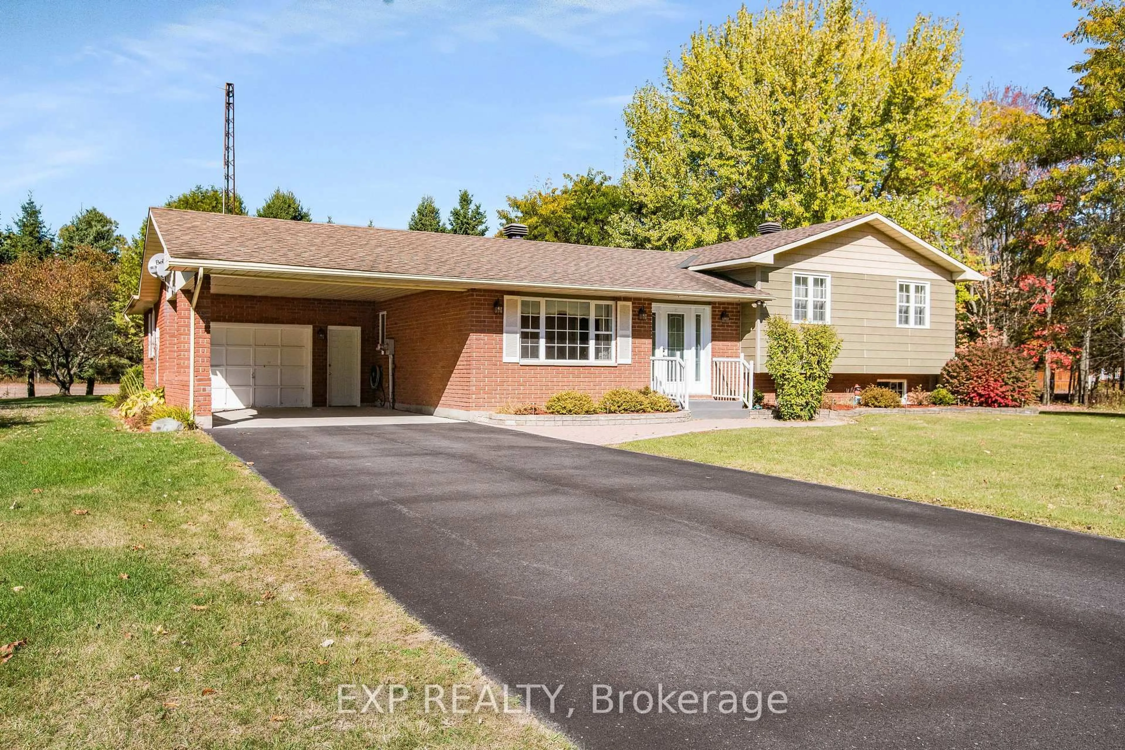 Home with brick exterior material, street for 384 Route 200 Rd, The Nation Ontario K0A 1M0