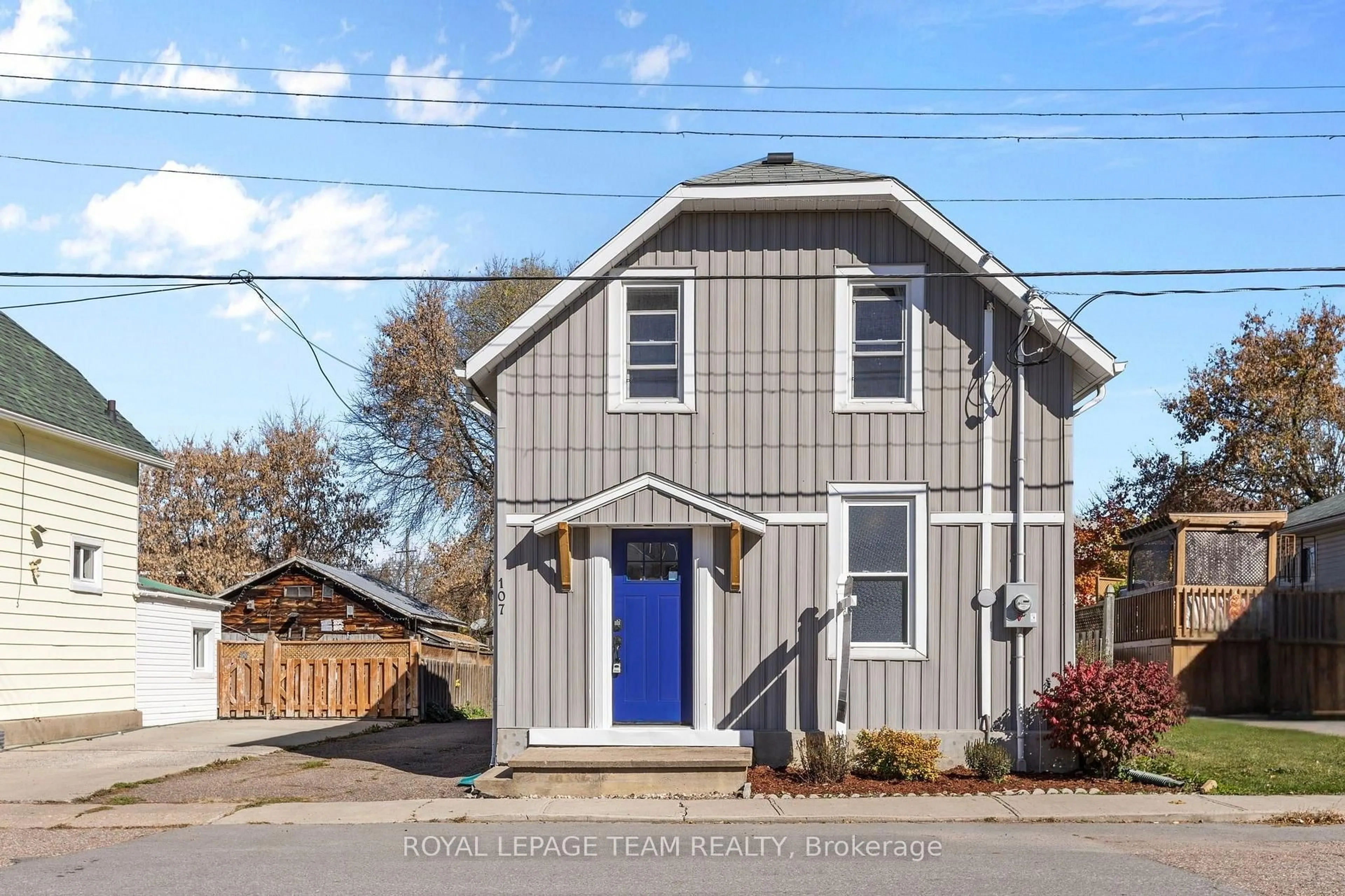 Home with vinyl exterior material, street for 107 Queen St, Renfrew Ontario K7V 2A4