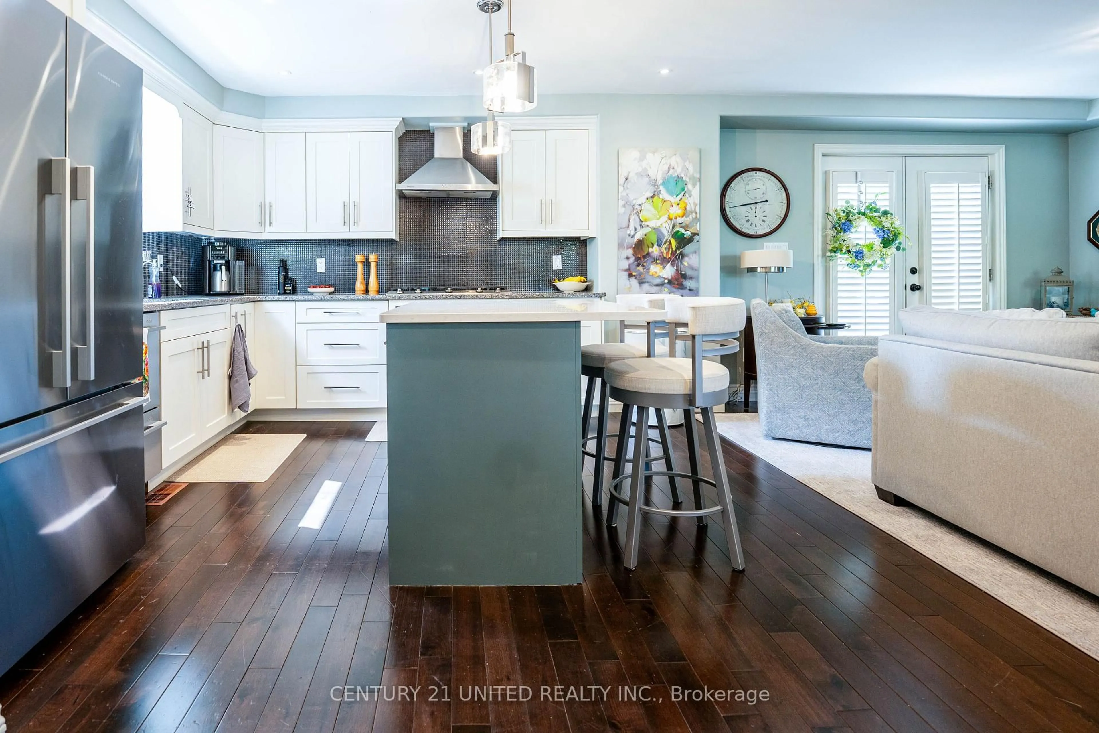 Open concept kitchen, wood/laminate floor for 1 Wallace St, Peterborough Ontario K9H 1A8