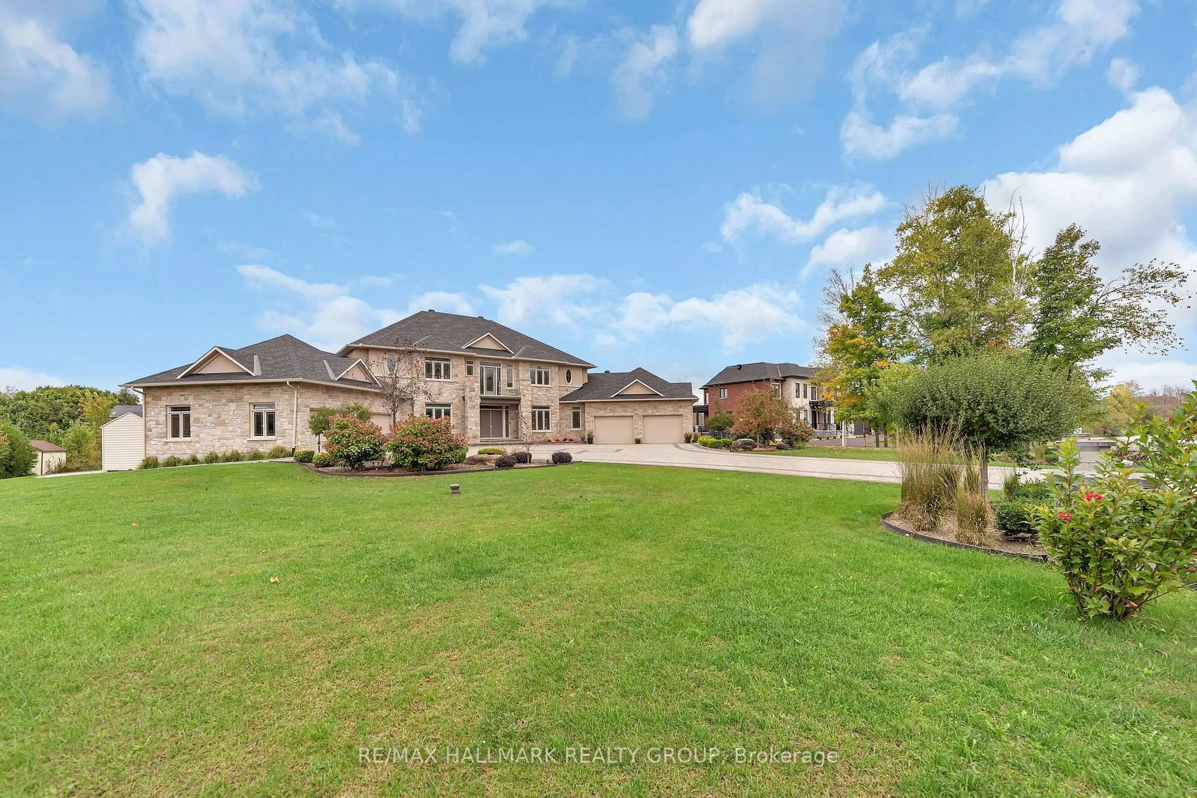 A pic from outside/outdoor area/front of a property/back of a property/a pic from drone, water/lake/river/ocean view for 5813 Red Castle Rdge, Ottawa Ontario K4M 0A4