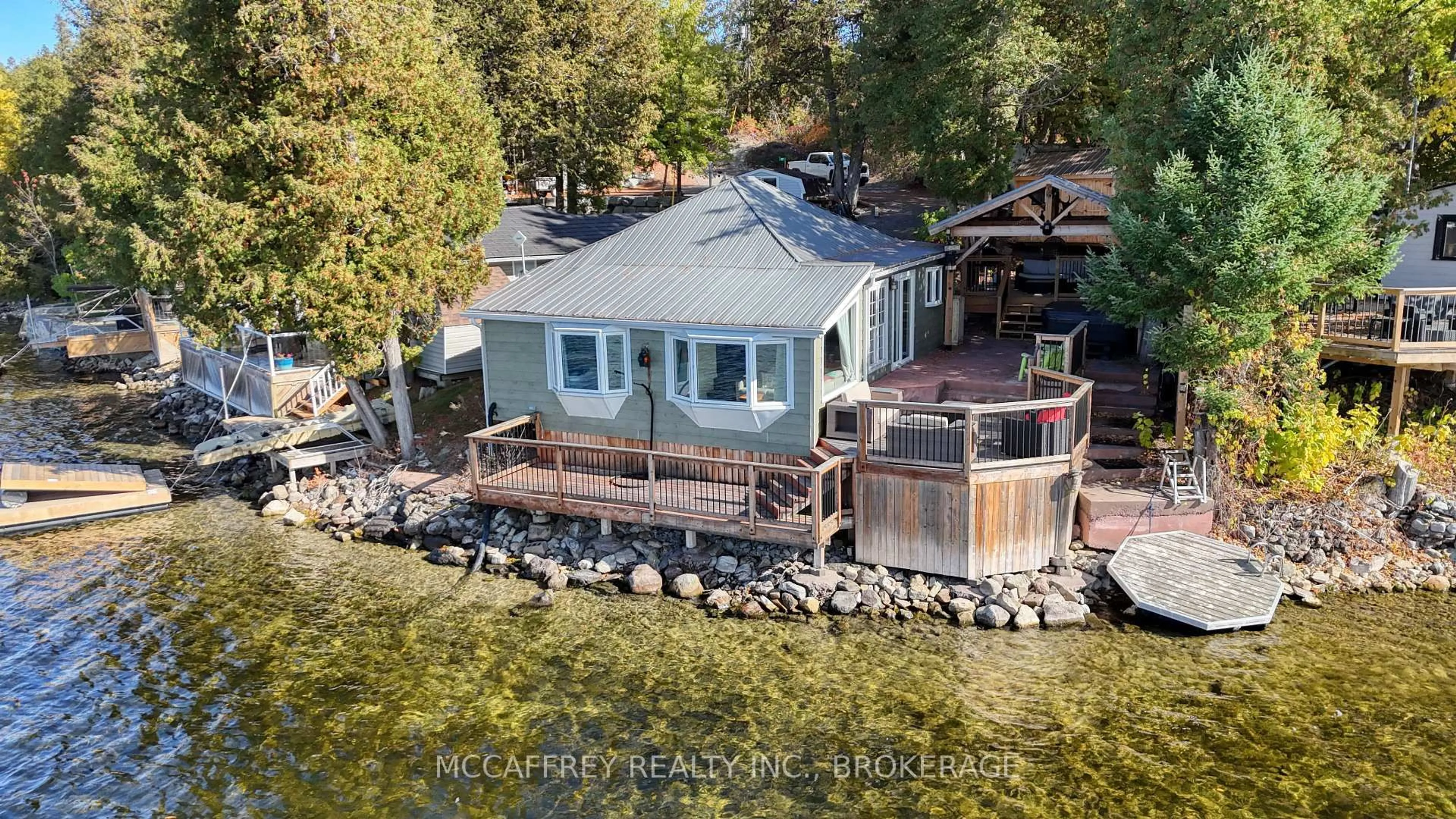 A pic from outside/outdoor area/front of a property/back of a property/a pic from drone, water/lake/river/ocean view for 19 Cherry Lane, Tamworth Ontario K0K 3G0