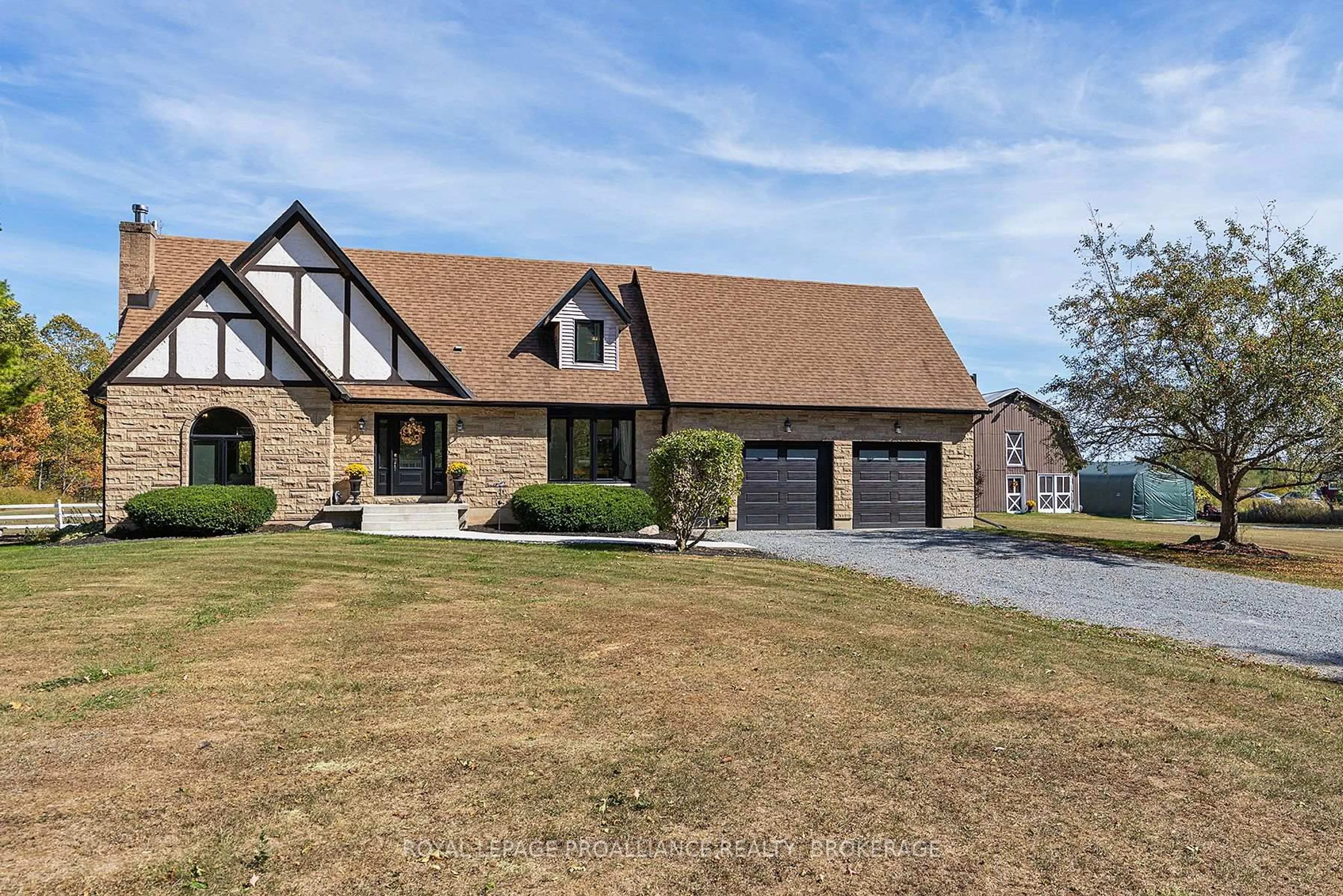Home with brick exterior material, street for 3746 Stage Coach Rd, Harrowsmith Ontario K0H 1V0