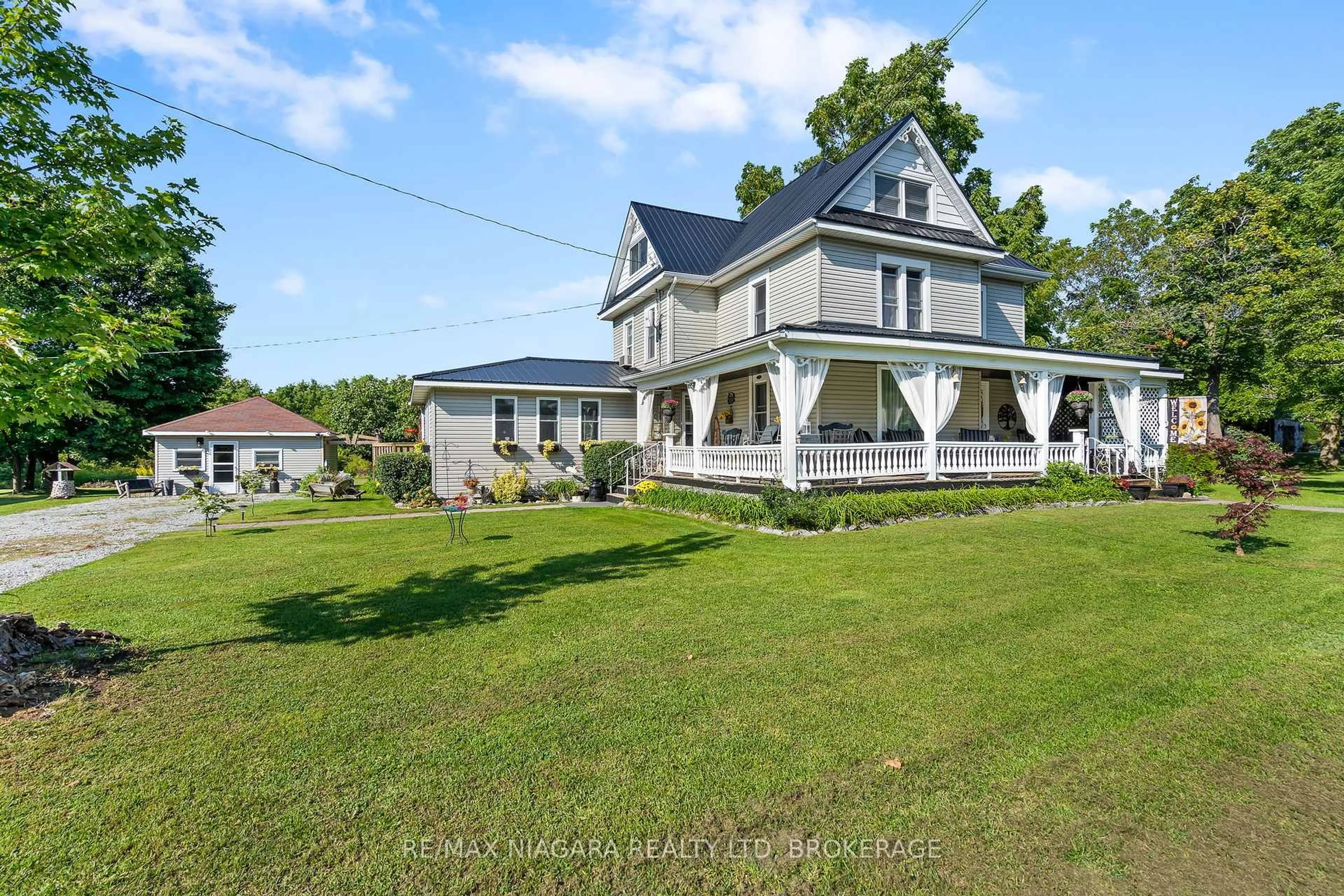 A pic from outside/outdoor area/front of a property/back of a property/a pic from drone, unknown for 11562 Lakeshore Rd, Wainfleet Ontario L3K 5V4