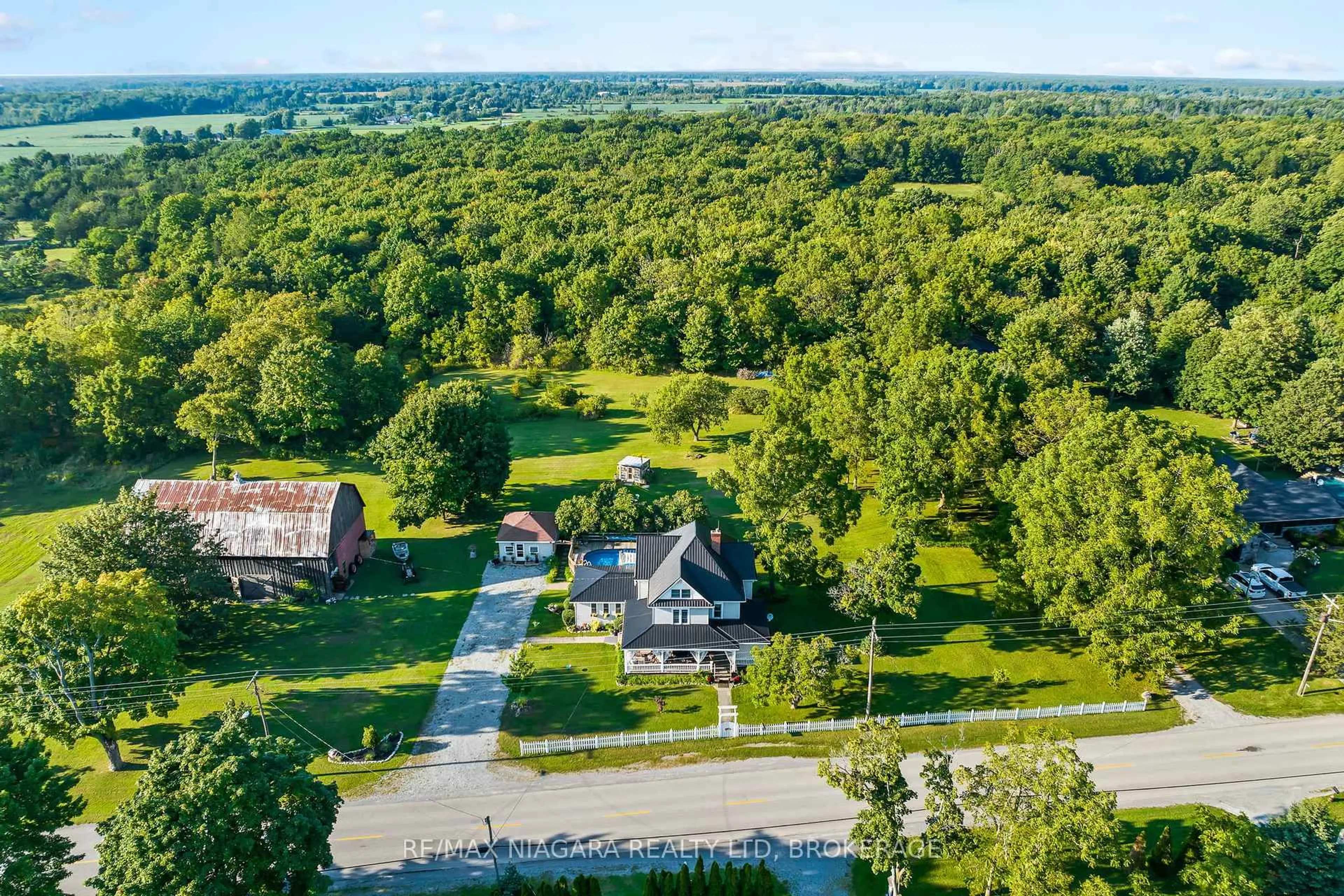 A pic from outside/outdoor area/front of a property/back of a property/a pic from drone, water/lake/river/ocean view for 11562 Lakeshore Rd, Wainfleet Ontario L3K 5V4