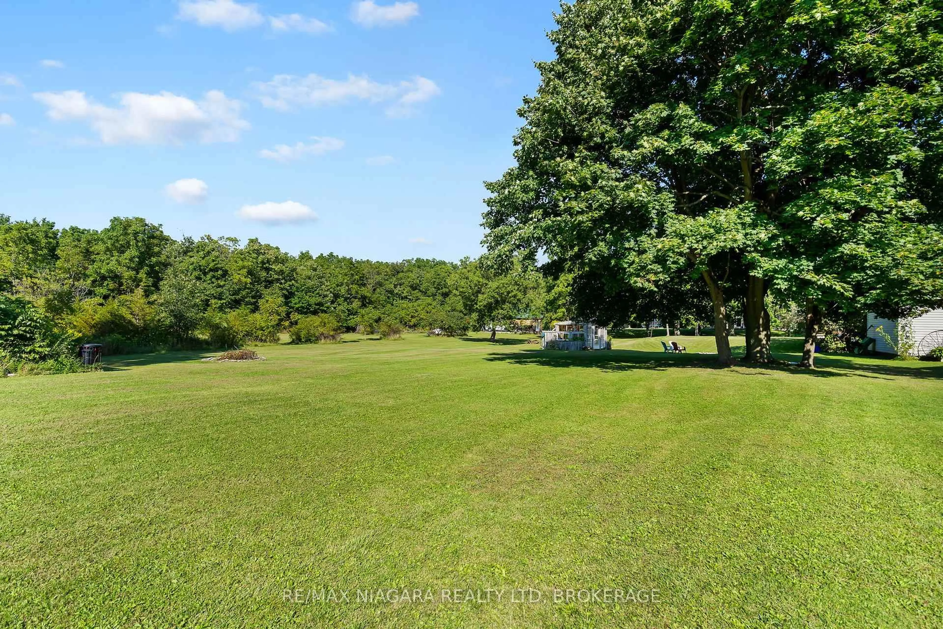 A pic from outside/outdoor area/front of a property/back of a property/a pic from drone, forest/trees view for 11562 Lakeshore Rd, Wainfleet Ontario L3K 5V4