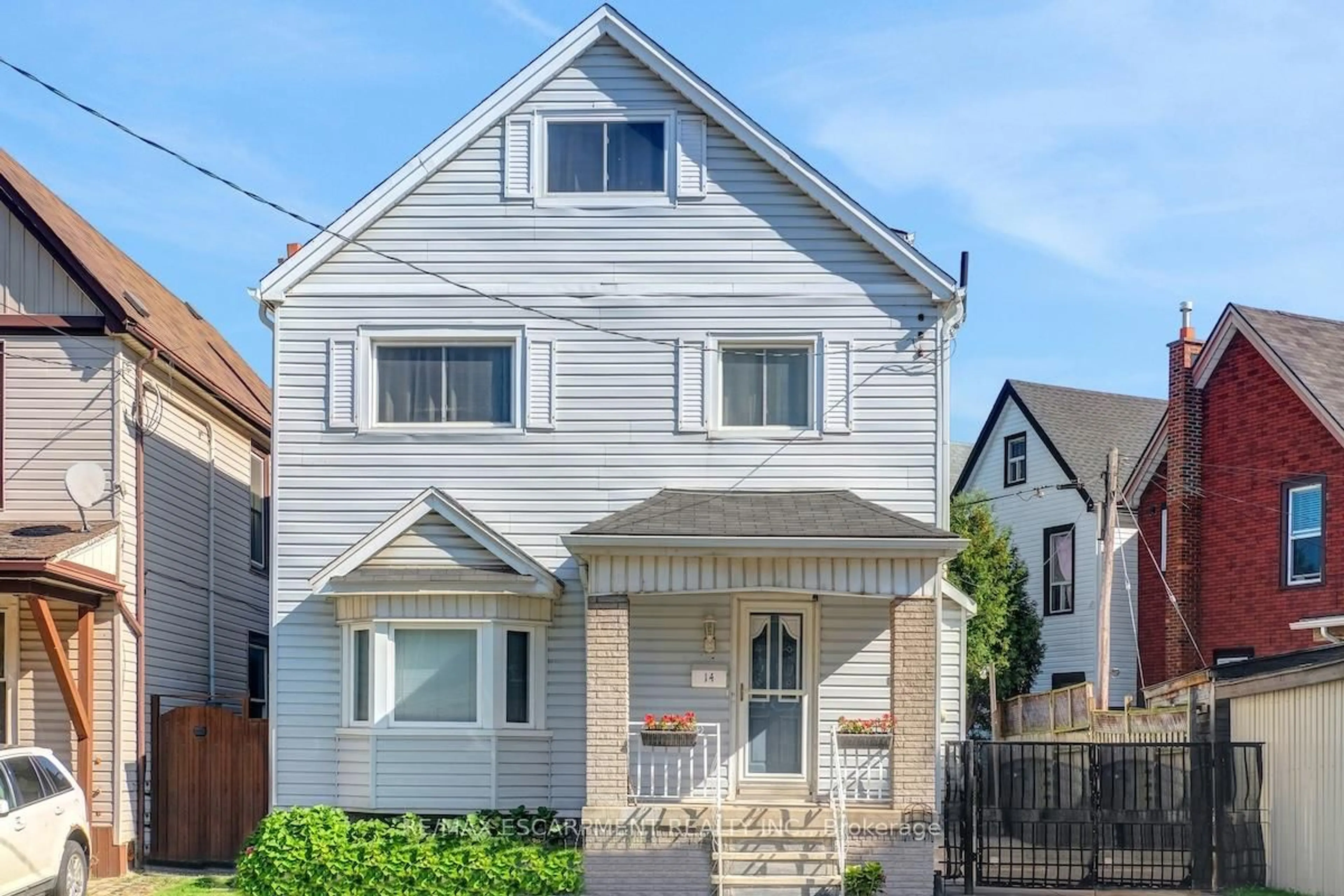 Home with brick exterior material, street for 14 Niagara St, Hamilton Ontario L8L 6A2