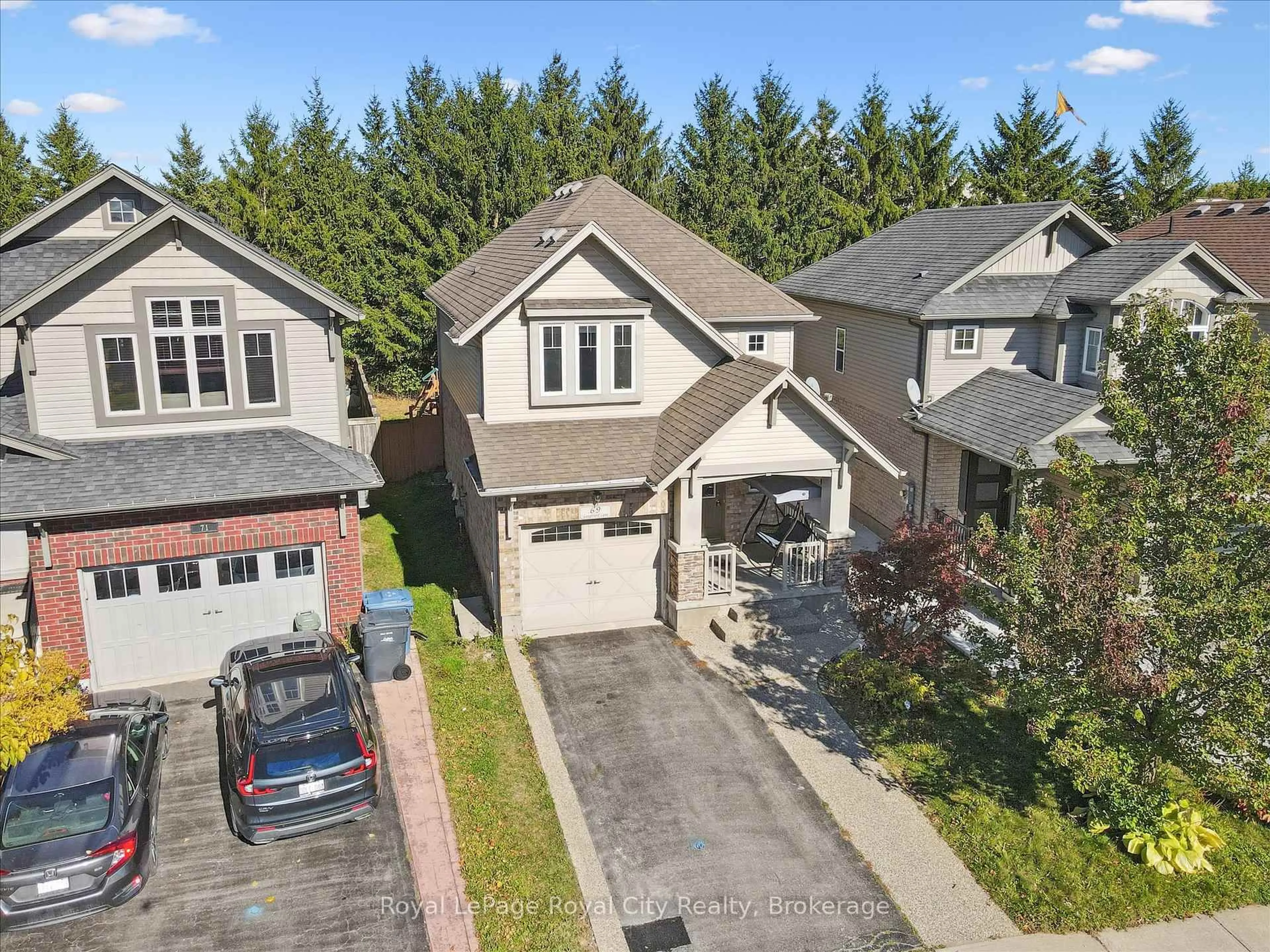 A pic from outside/outdoor area/front of a property/back of a property/a pic from drone, street for 69 Laughland Lane, Guelph Ontario N1L 0C6