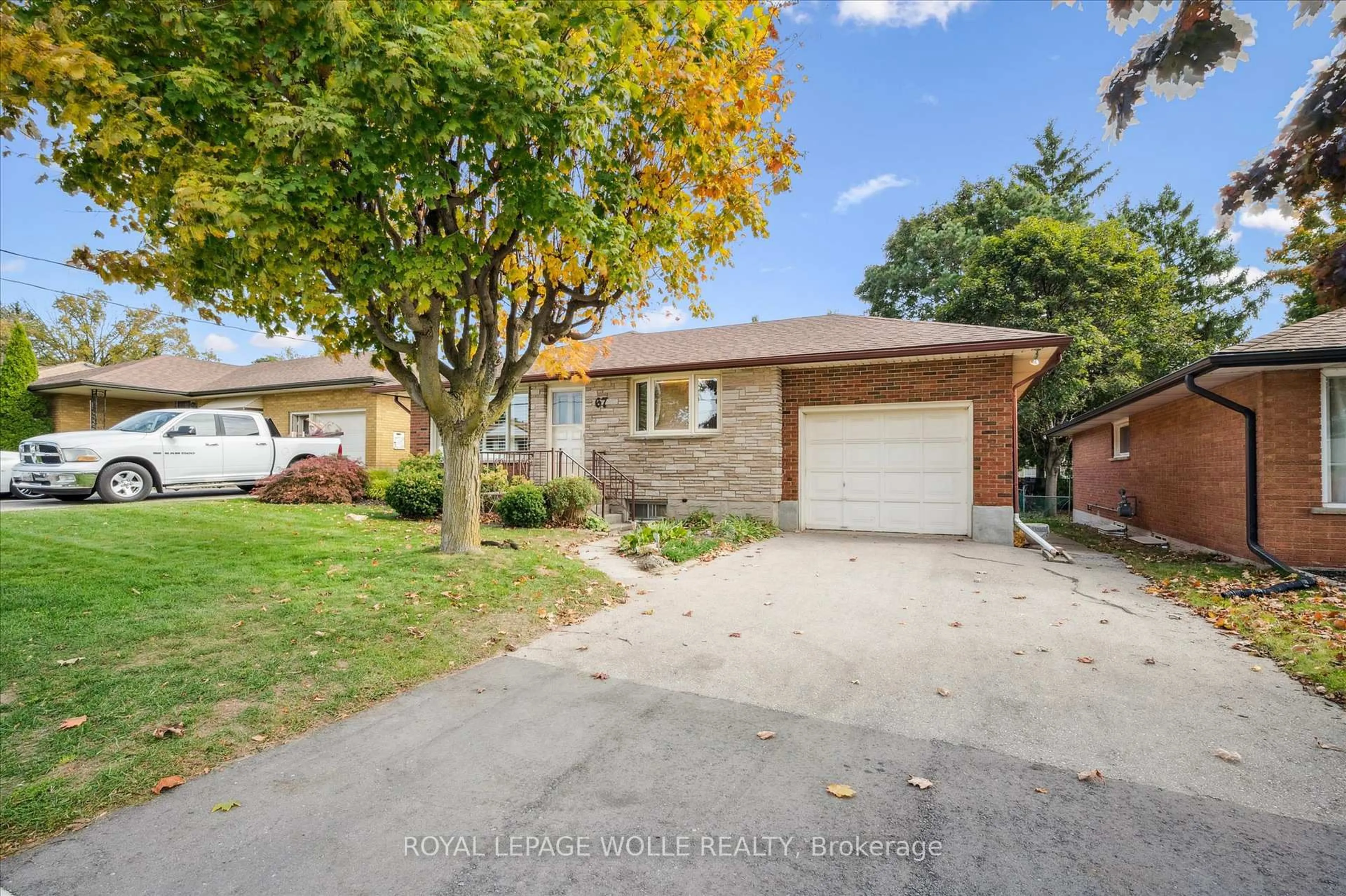 Home with brick exterior material, street for 67 Traynor Ave, Kitchener Ontario N2C 1W1