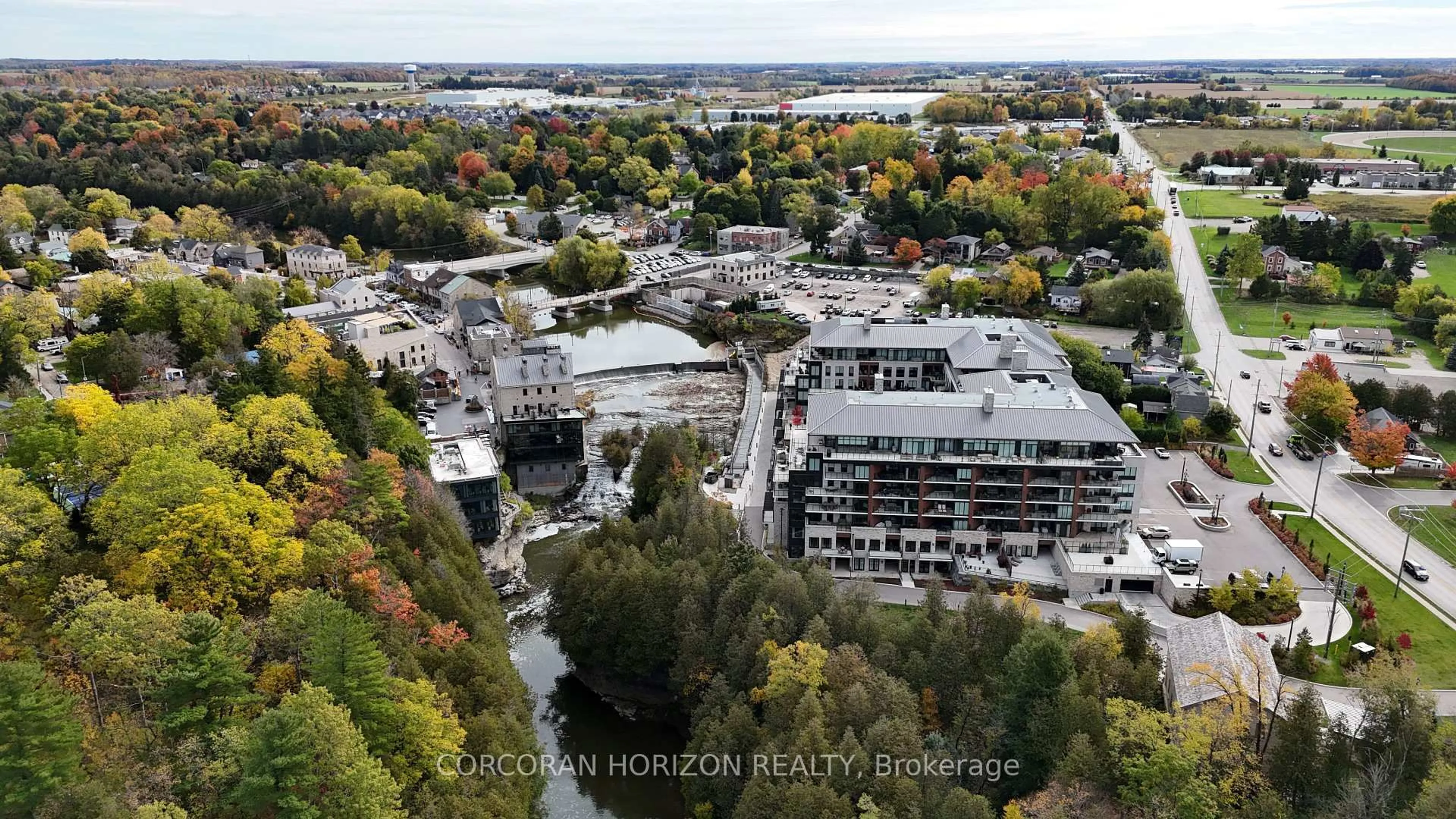 A pic from outside/outdoor area/front of a property/back of a property/a pic from drone, city buildings view from balcony for 6523 Wellington 7 Rd #109, Centre Wellington Ontario N0B 1S0