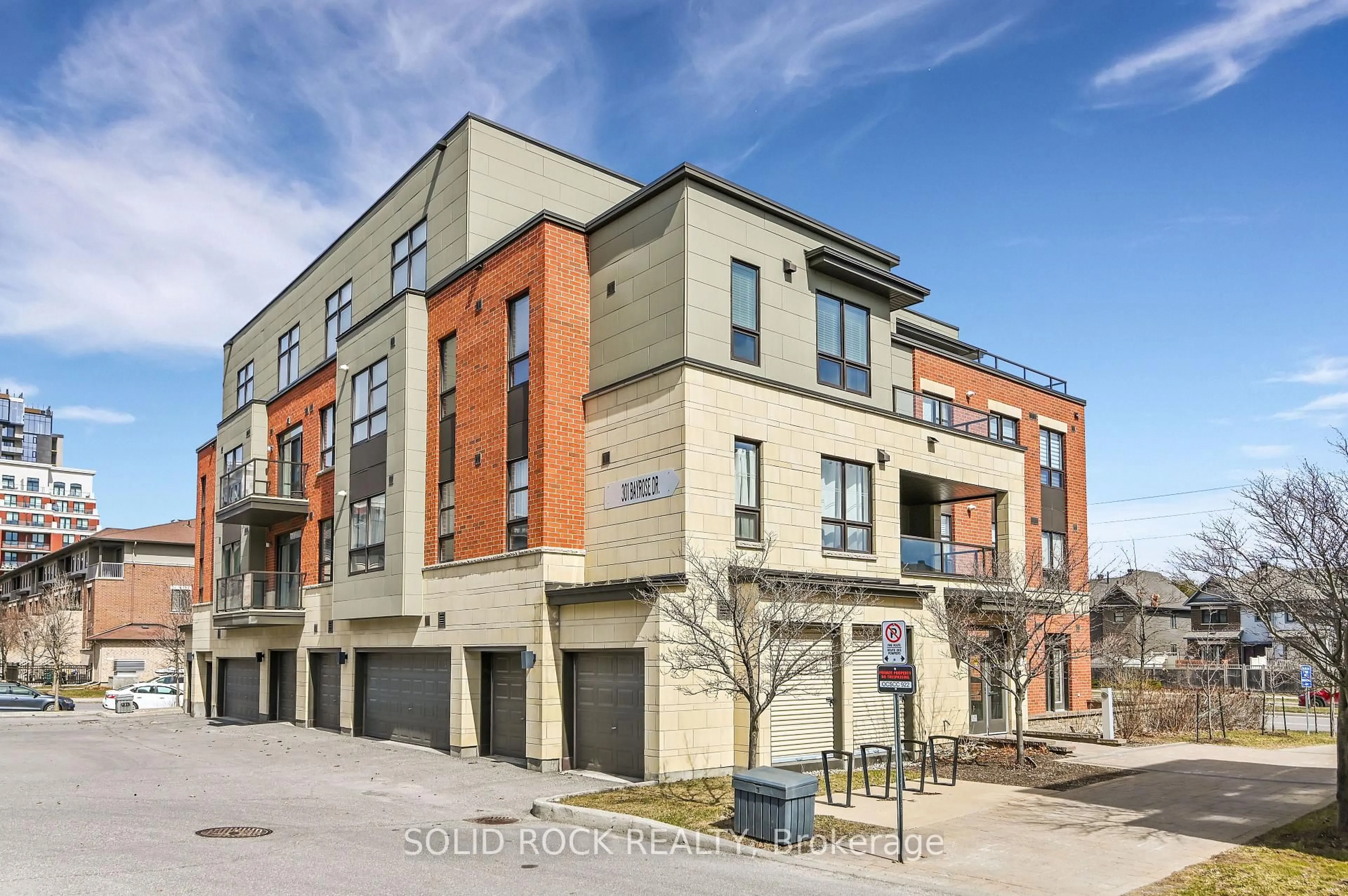 A pic from outside/outdoor area/front of a property/back of a property/a pic from drone, street for 301 BAYROSE Dr #302, Nepean Ontario K2J 5W3