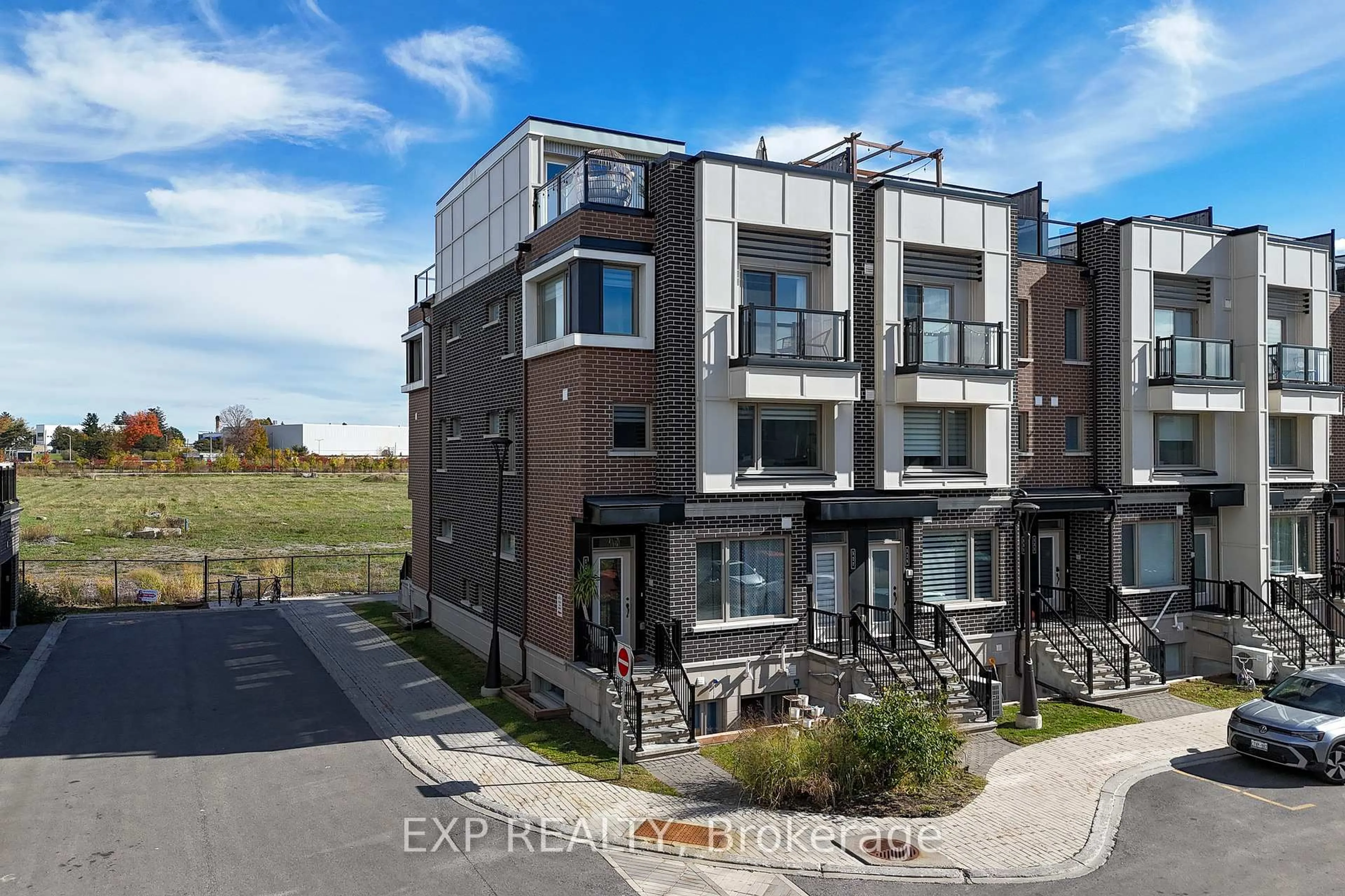 A pic from outside/outdoor area/front of a property/back of a property/a pic from drone, street for 525 Ozawa Private, Ottawa Ontario K1K 4Z8