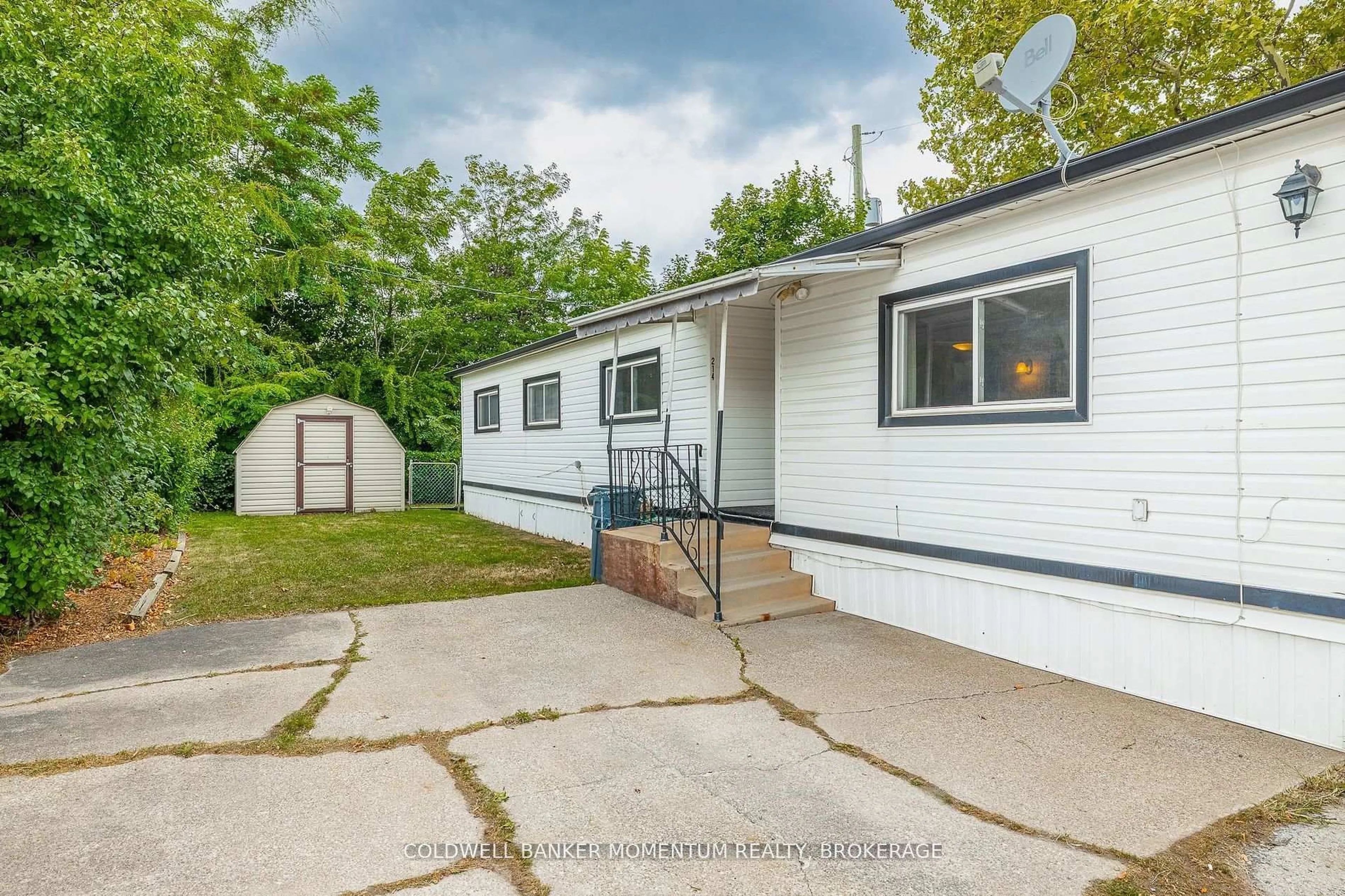 Home with vinyl exterior material, street for 241 St. Paul St #214, St. Catharines Ontario L2S 2E5