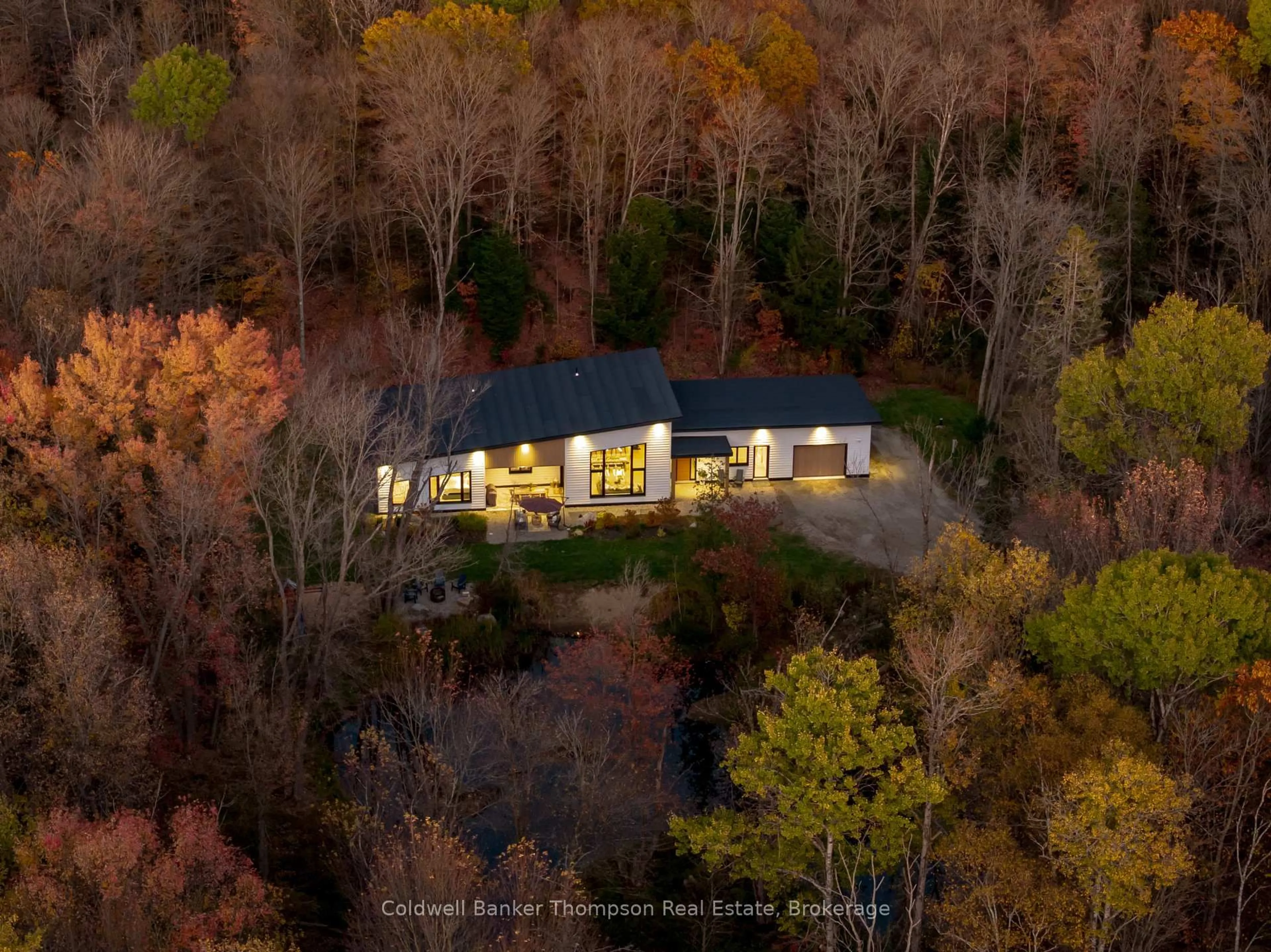 A pic from outside/outdoor area/front of a property/back of a property/a pic from drone, forest/trees view for 753 Williamsport Rd, Huntsville Ontario P1H 2J4