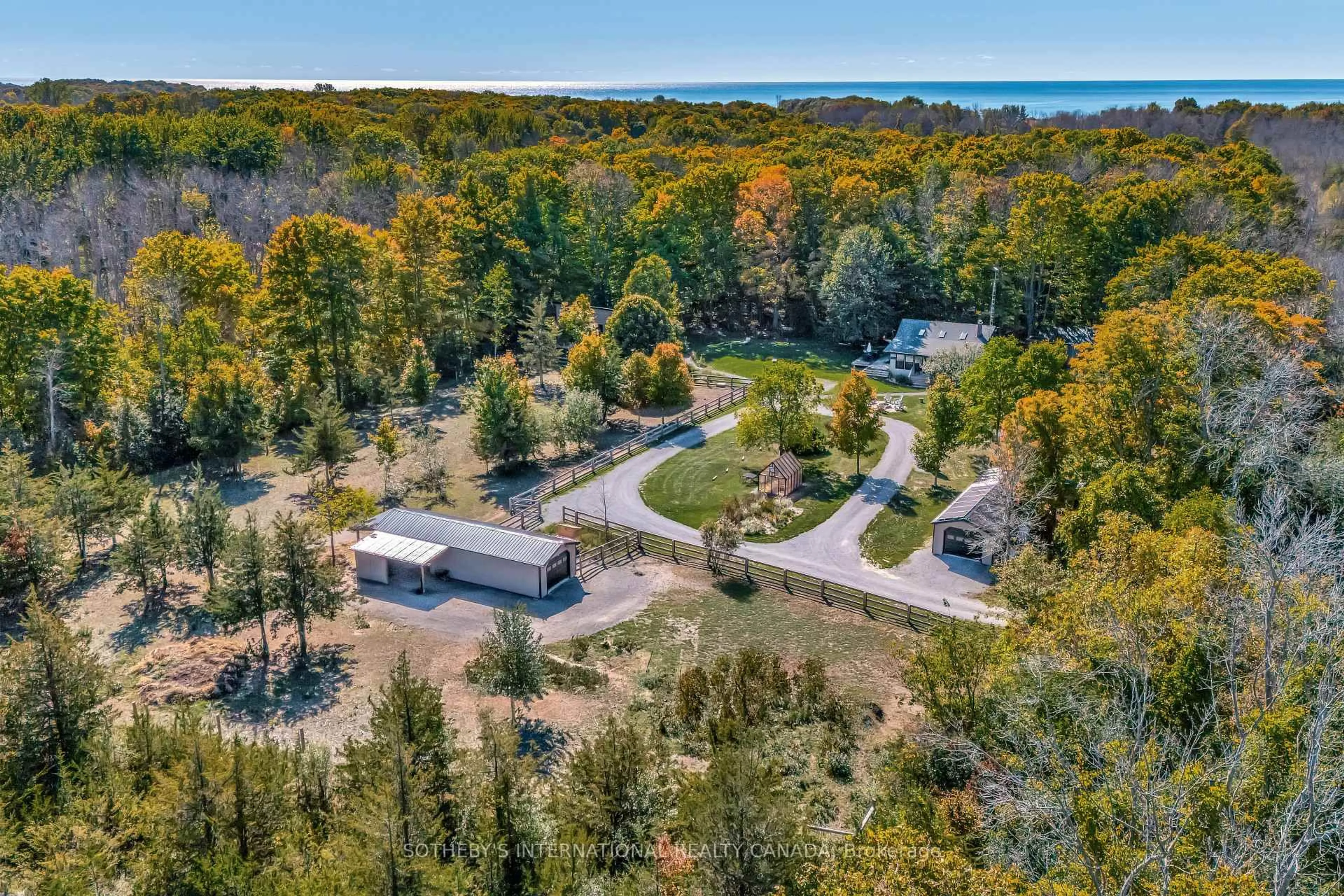 A pic from outside/outdoor area/front of a property/back of a property/a pic from drone, forest/trees view for 220 Easterbrook Rd, Prince Edward County Ontario K0K 2P0