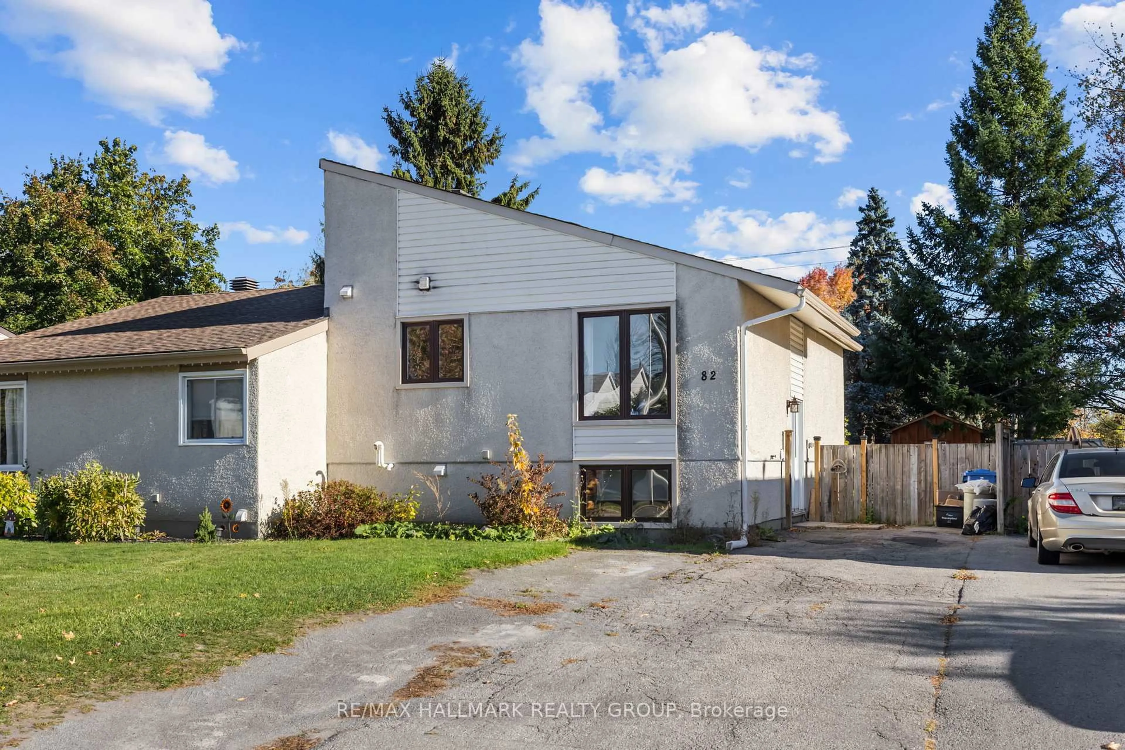 Home with vinyl exterior material, street for 82 Glamorgan Dr, Ottawa Ontario K2L 1R4