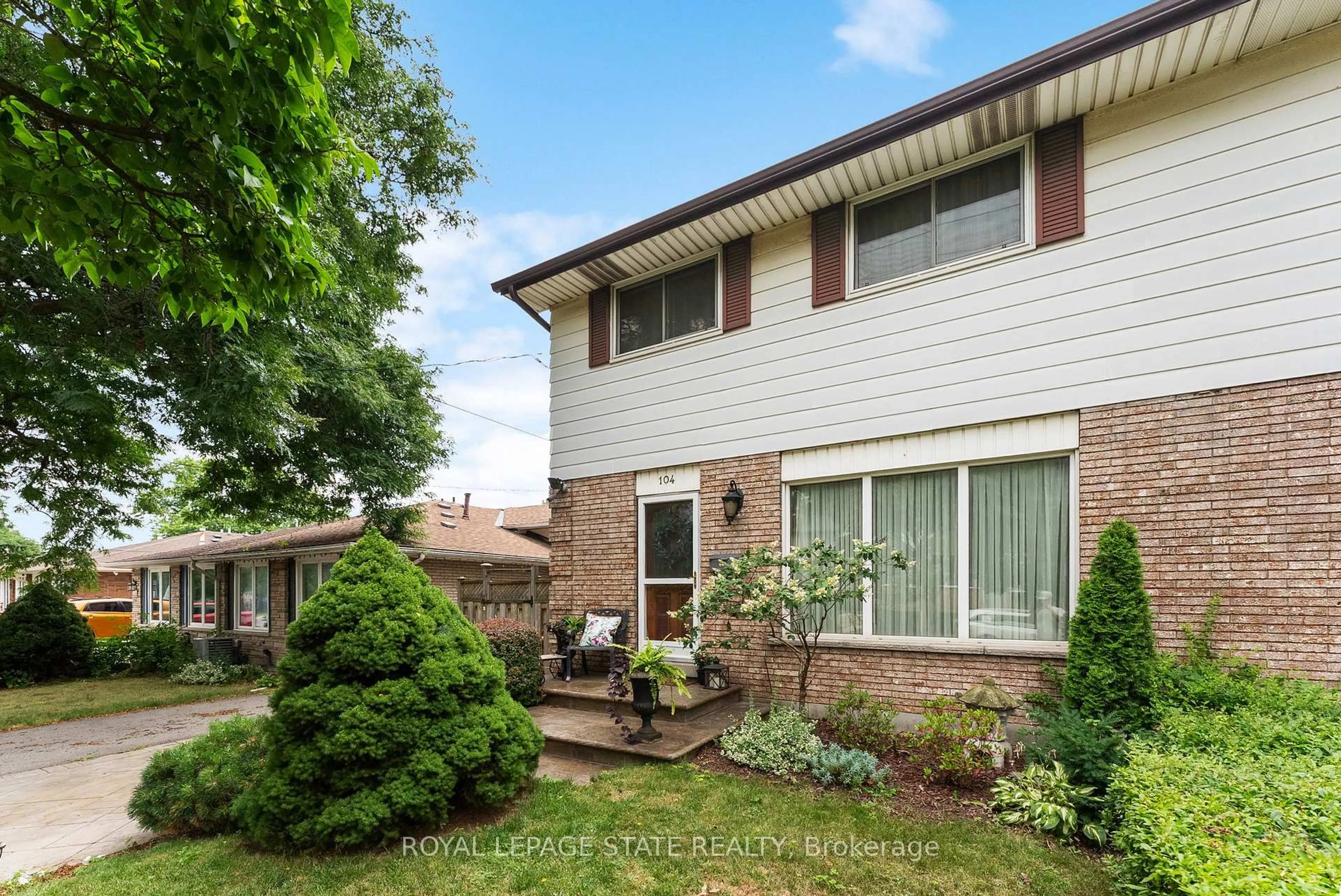 Home with brick exterior material, street for 104 Berkindale Dr, Hamilton Ontario L8E 1M5