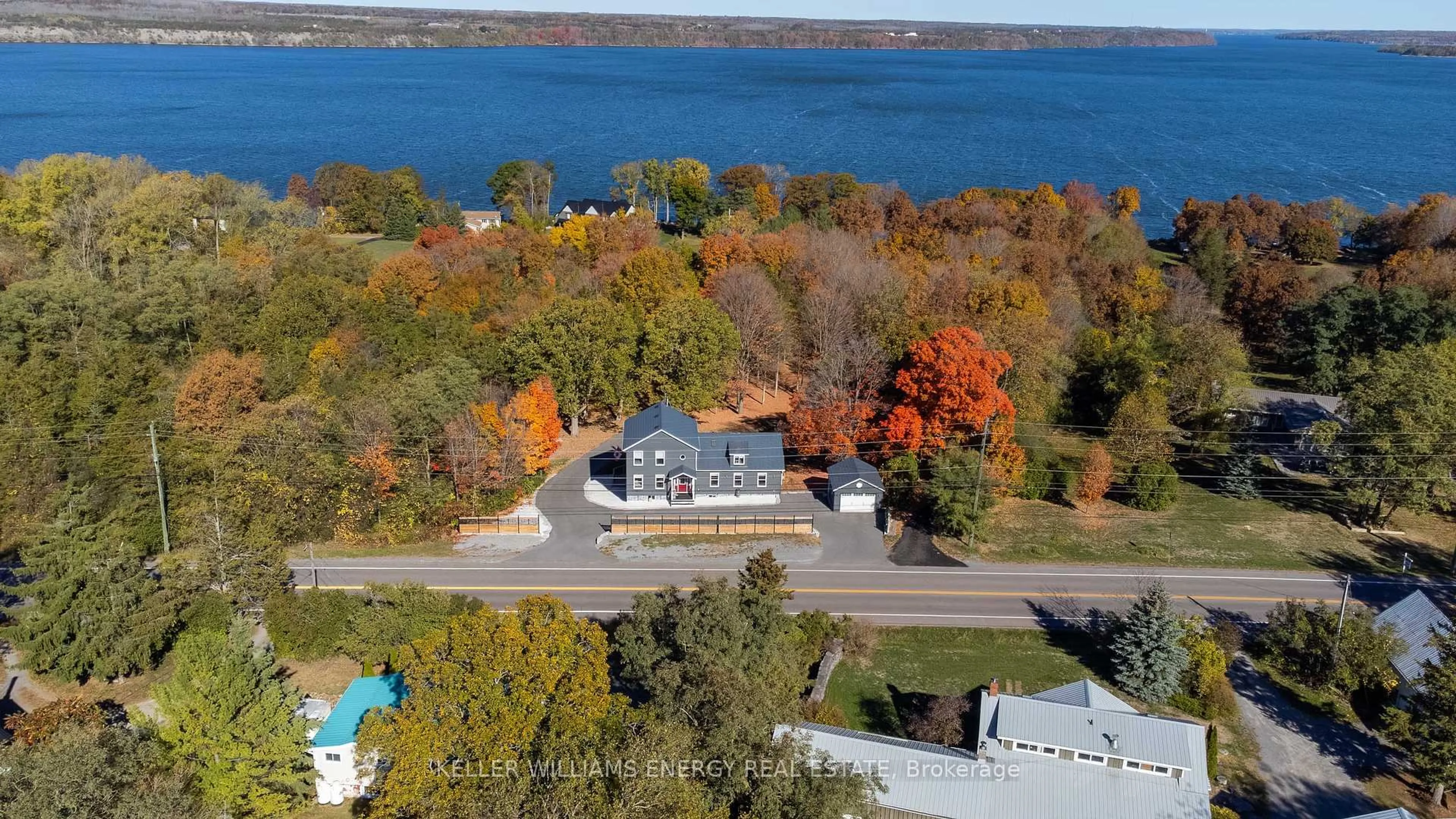 A pic from outside/outdoor area/front of a property/back of a property/a pic from drone, water/lake/river/ocean view for 11858 Loyalist Pkwy, Prince Edward County Ontario K0K 2T0