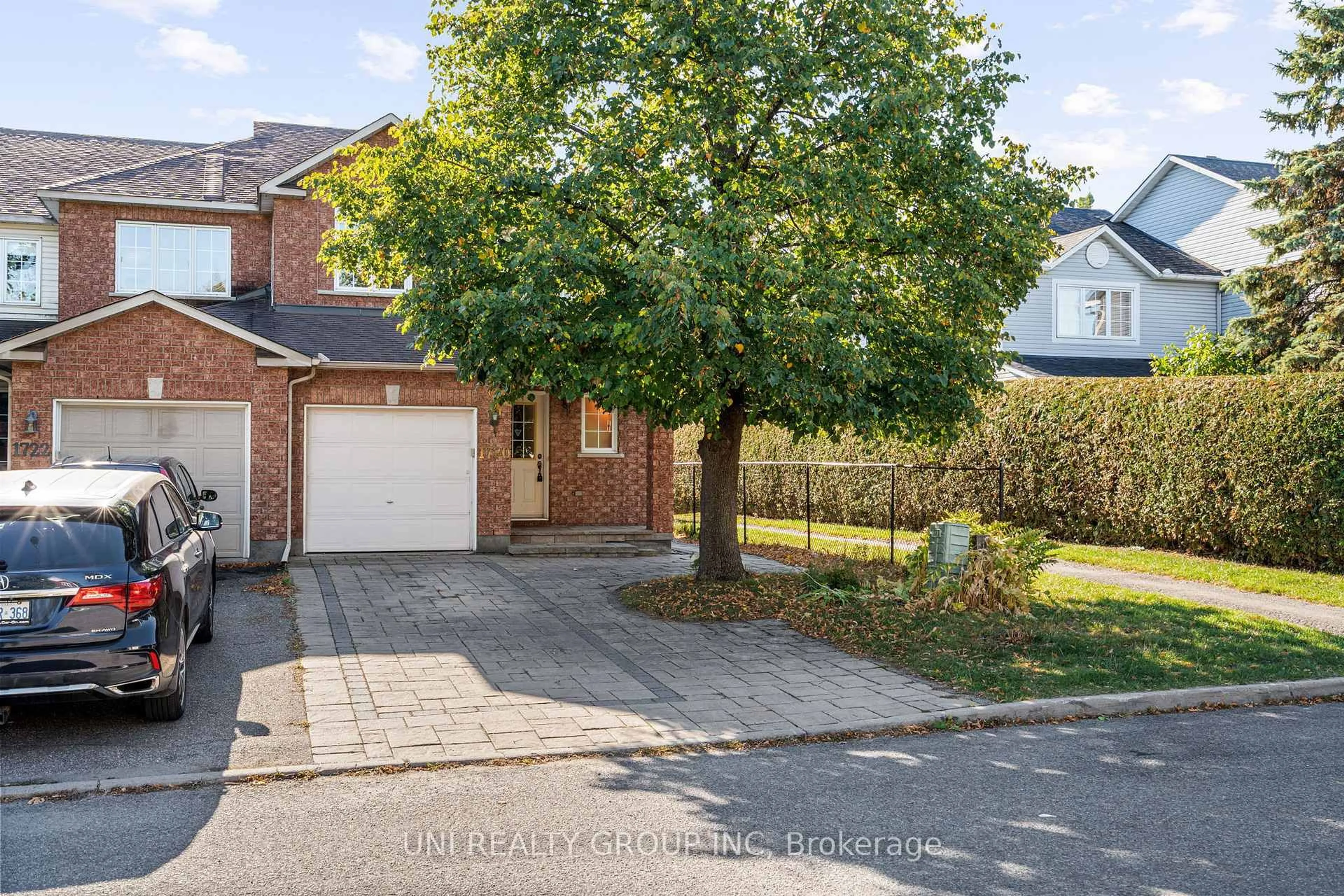 A pic from outside/outdoor area/front of a property/back of a property/a pic from drone, street for 1720 Jobin Cres, Ottawa Ontario K1J 1C5