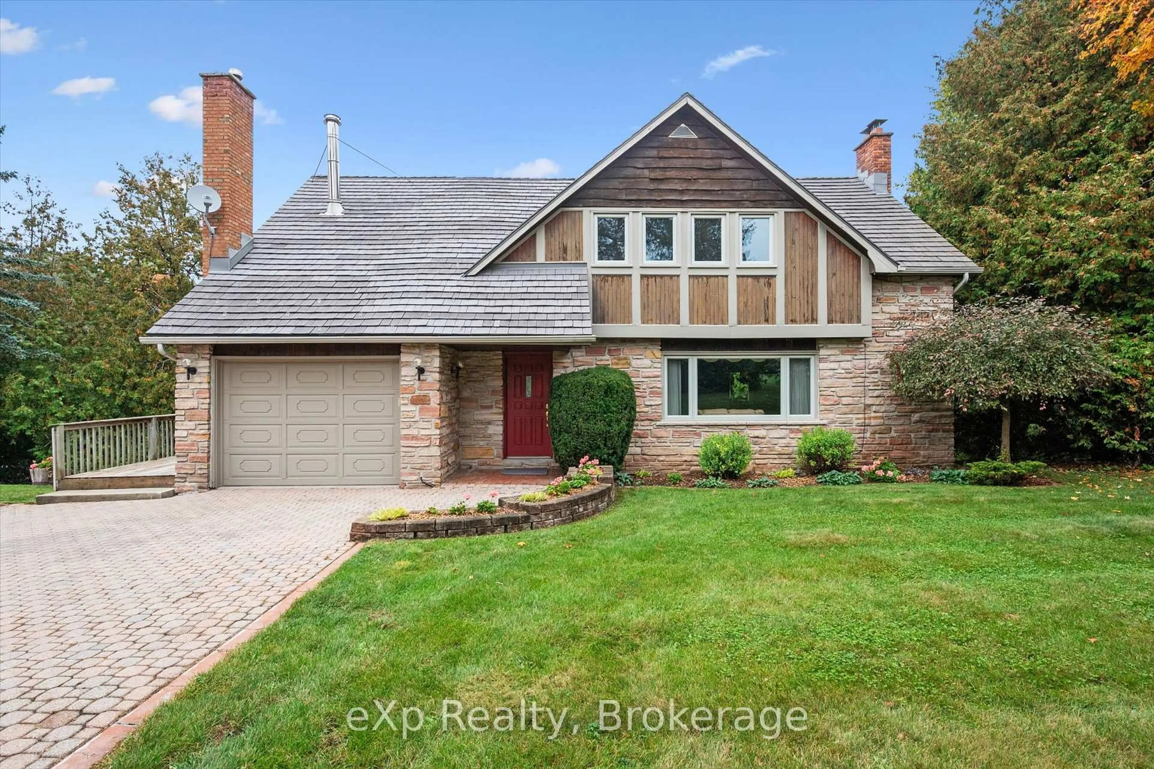 Home with brick exterior material, street for 32 Glenholme Dr, Guelph Ontario N1L 1C2