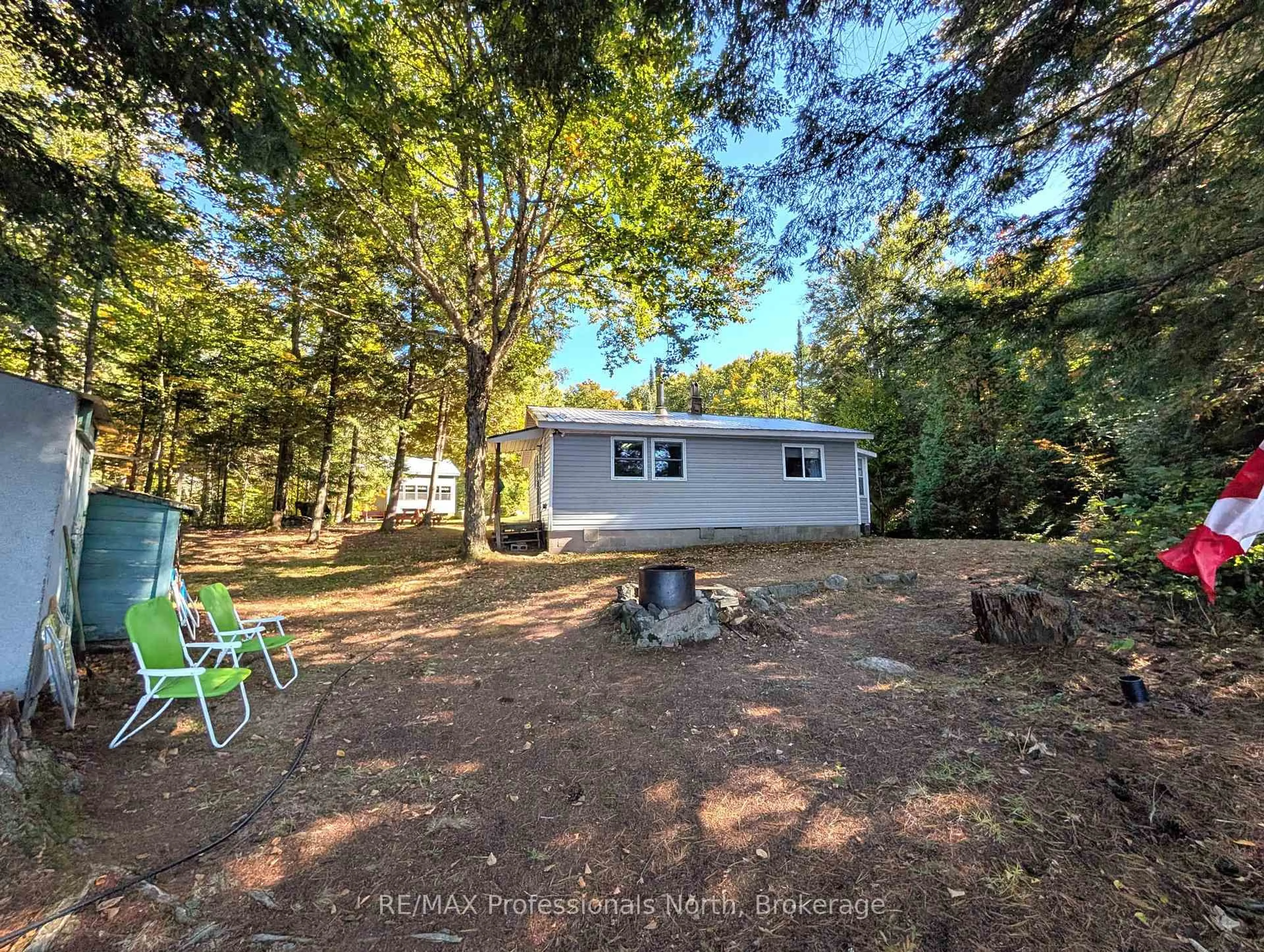 A pic from outside/outdoor area/front of a property/back of a property/a pic from drone, forest/trees view for 40 Centre Rd, Parry Sound Remote Area Ontario P0A 1X0