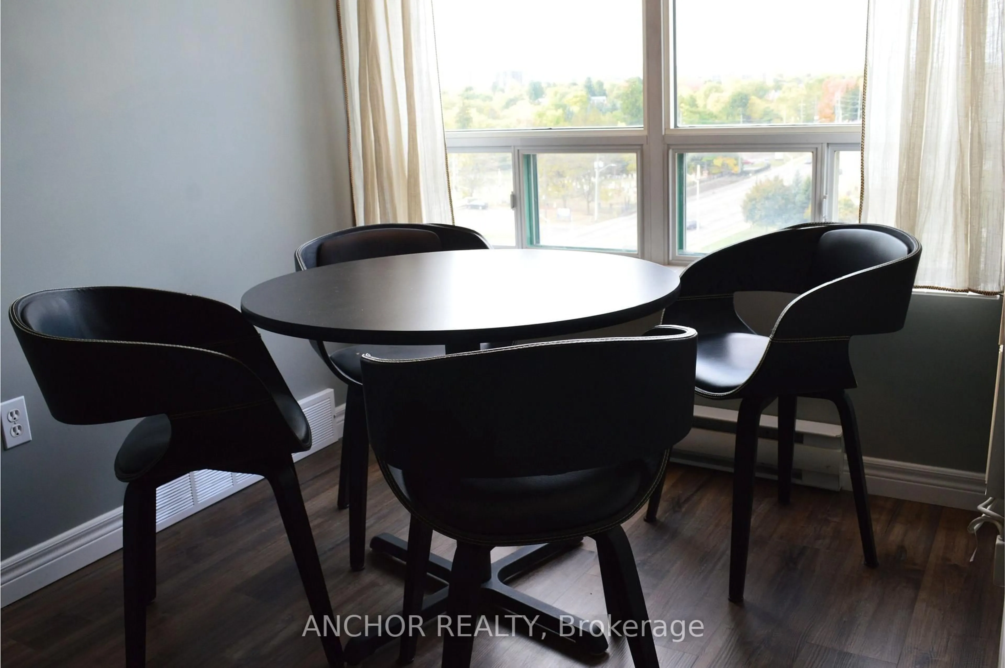 Dining room, wood/laminate floor for 333 Commissioners Rd #903, London South Ontario N6J 4X7