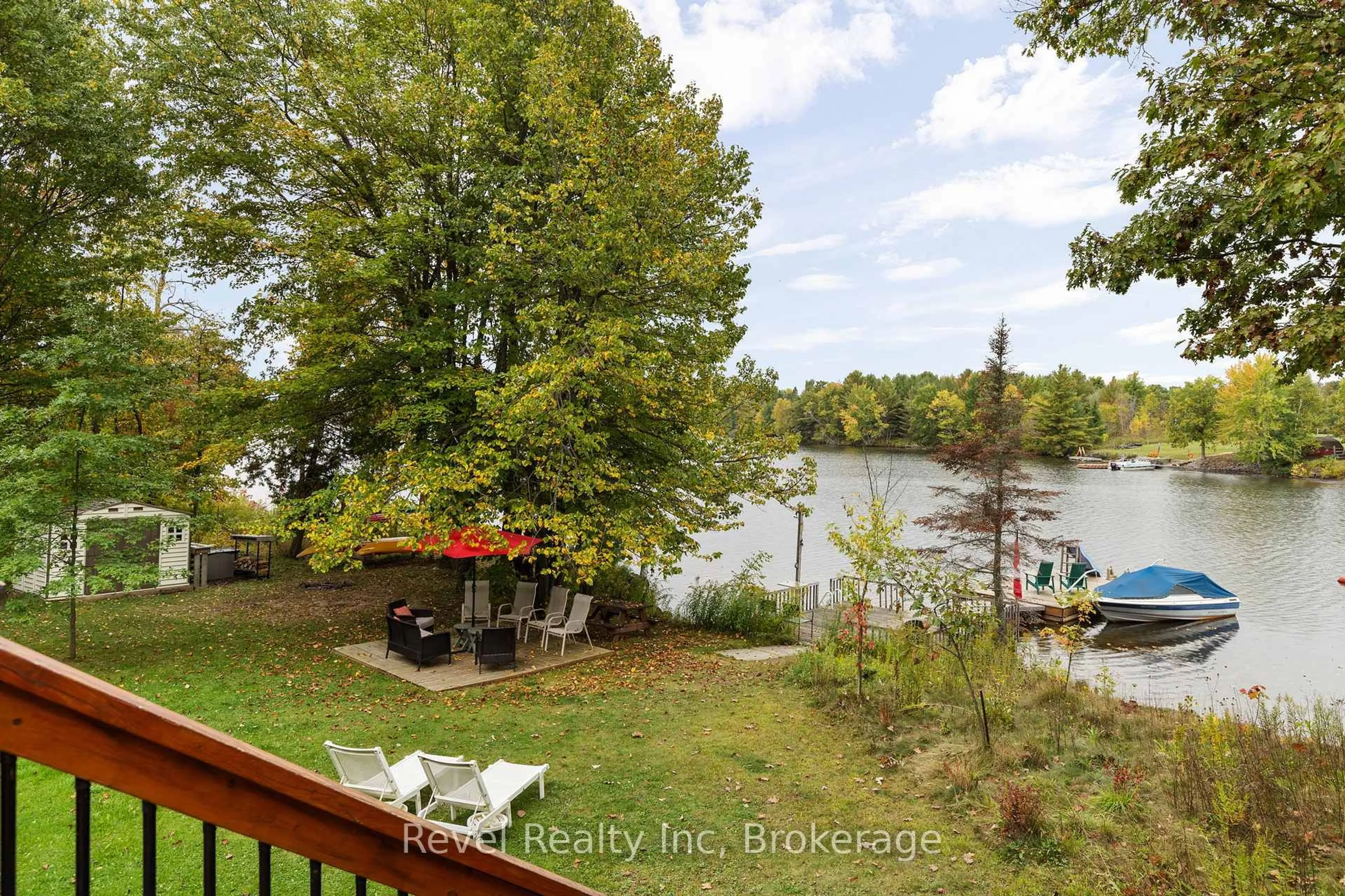 A pic from outside/outdoor area/front of a property/back of a property/a pic from drone, water/lake/river/ocean view for 210 Burnett's Rd, McKellar Ontario P2A 0B5