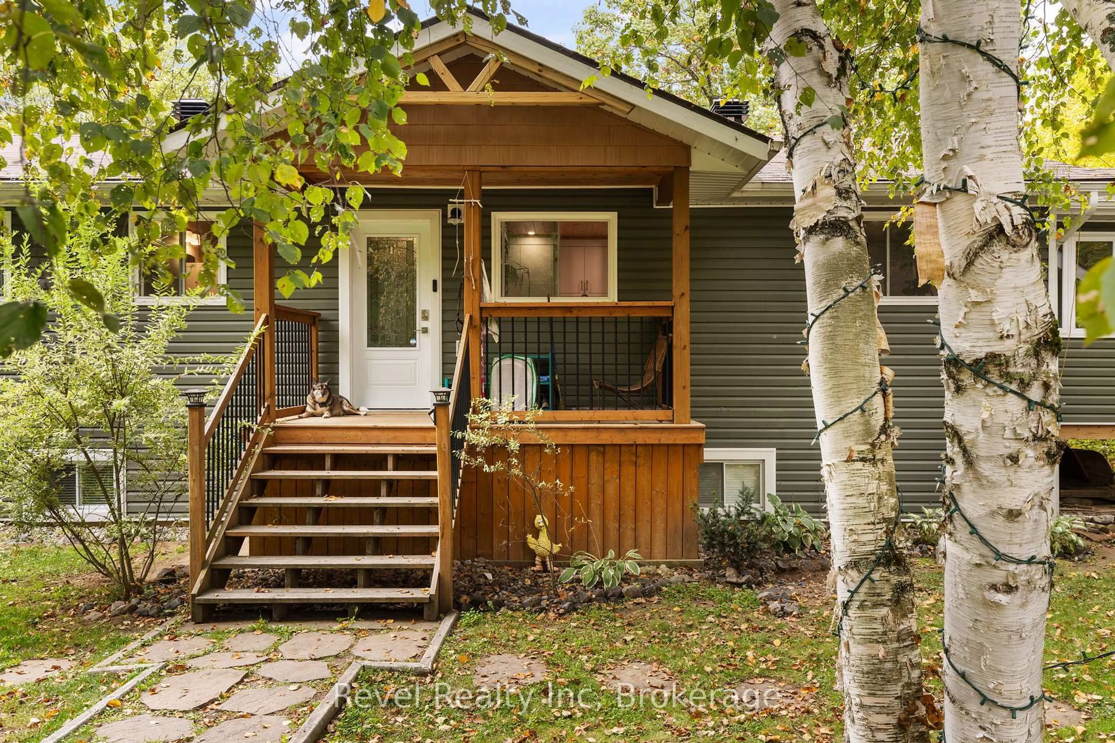 Home with vinyl exterior material, street for 210 Burnett's Rd, McKellar Ontario P2A 0B5