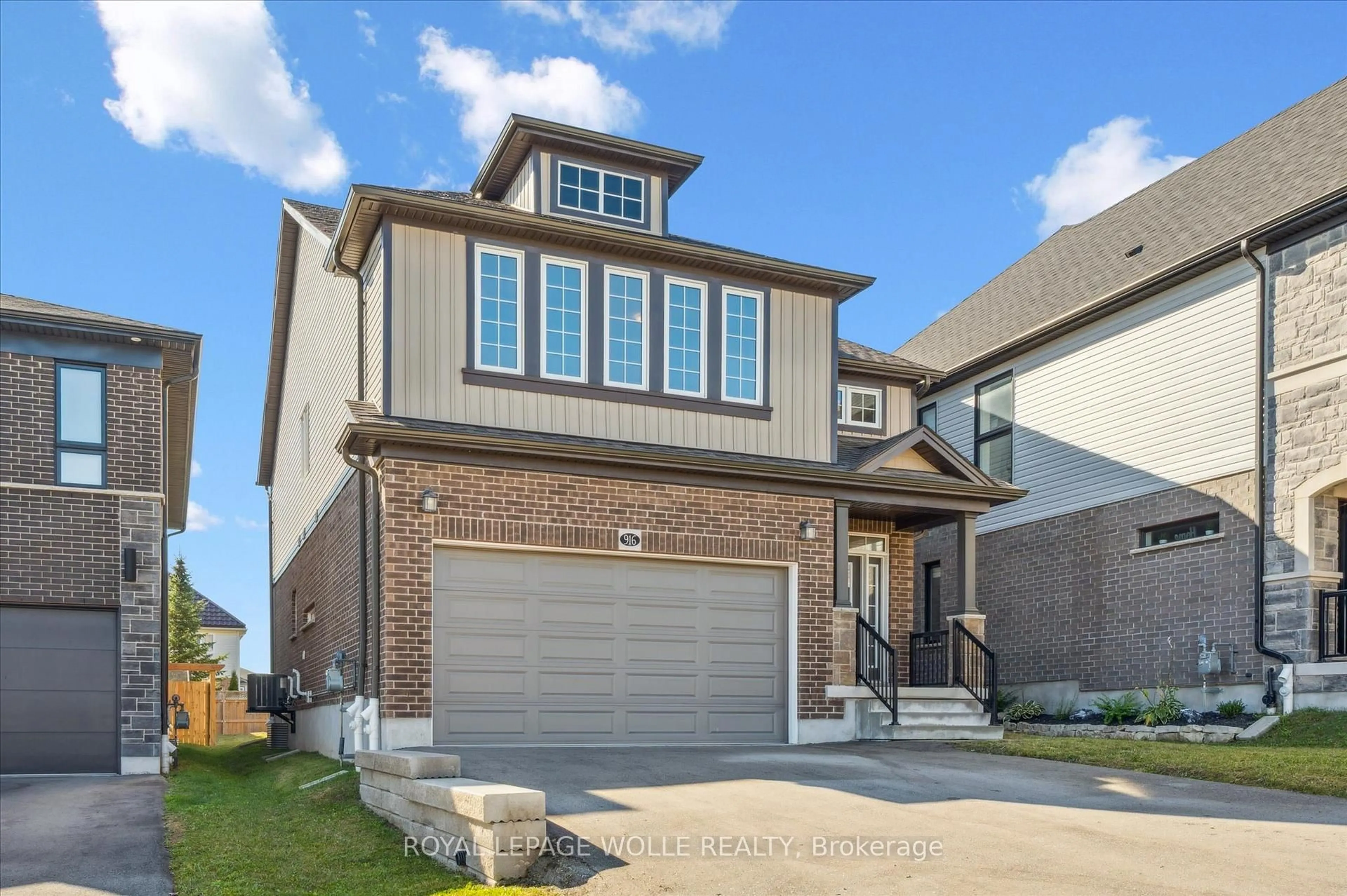 Home with brick exterior material, street for 916 Valencia Crt, Kitchener Ontario N2R 0R5