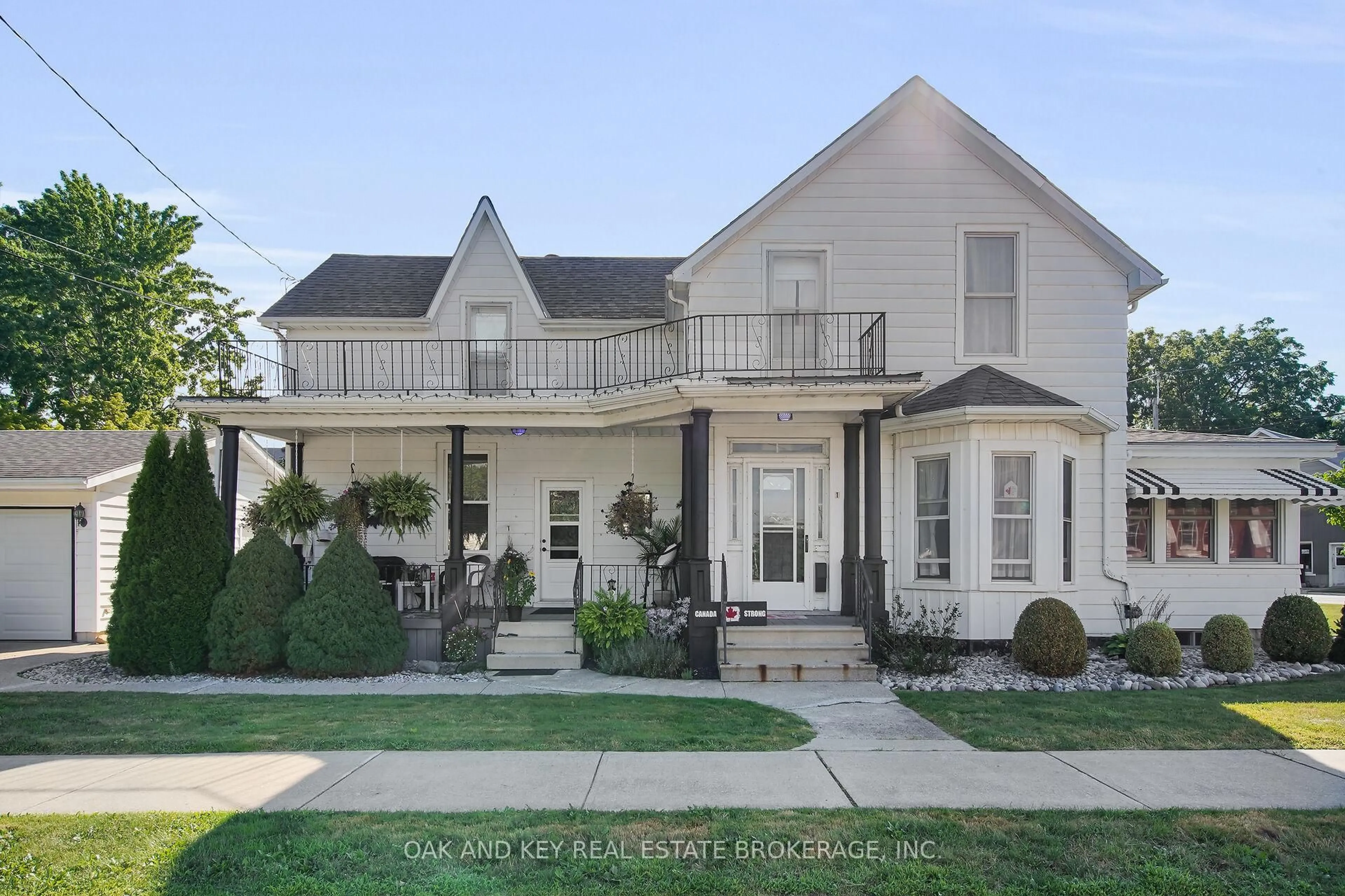 Home with vinyl exterior material, street for 1 Prince St, Lambton Shores Ontario N0N 1J0