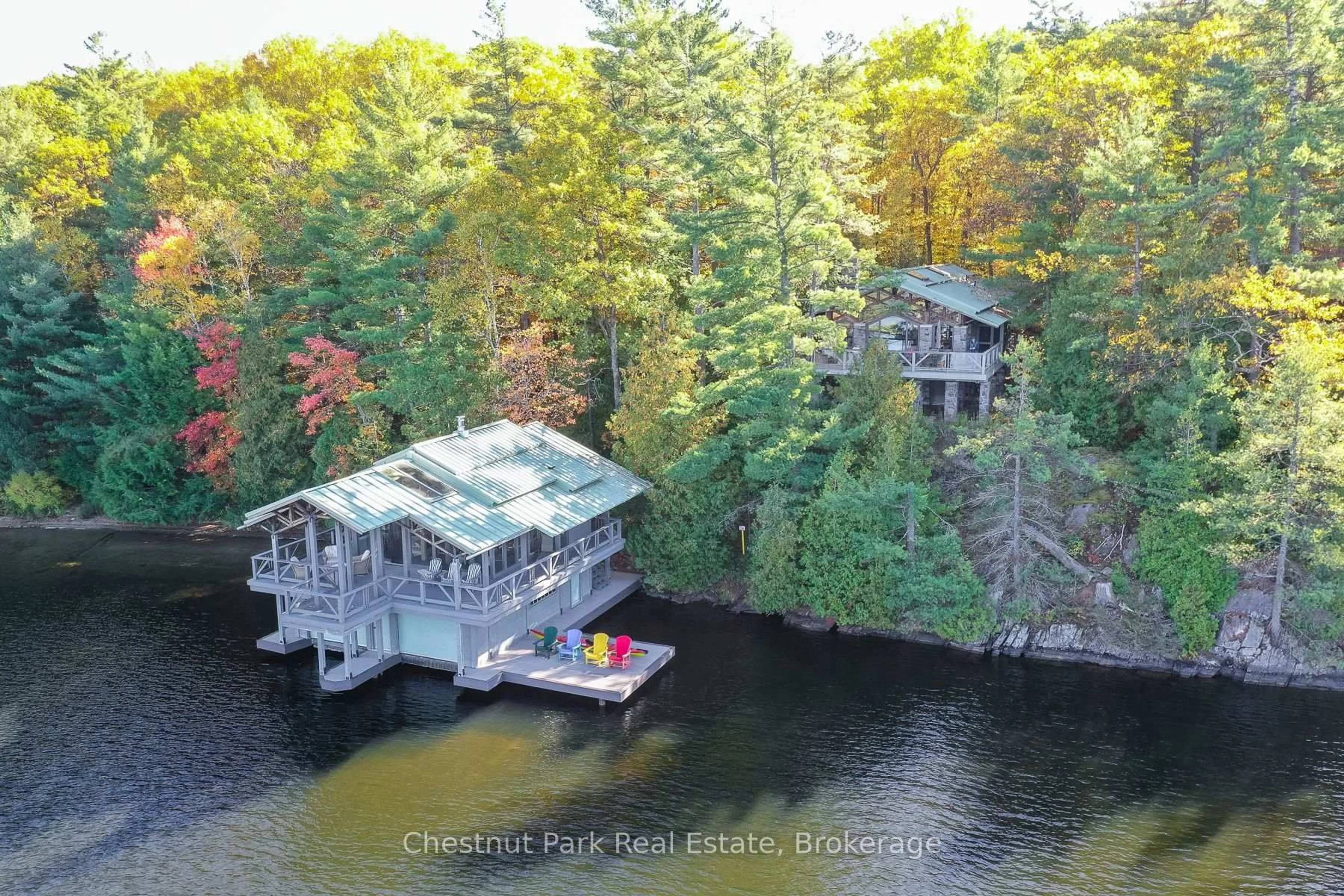 A pic from outside/outdoor area/front of a property/back of a property/a pic from drone, water/lake/river/ocean view for 1024 Neals Rd, Muskoka Lakes Ontario P0C 1M0