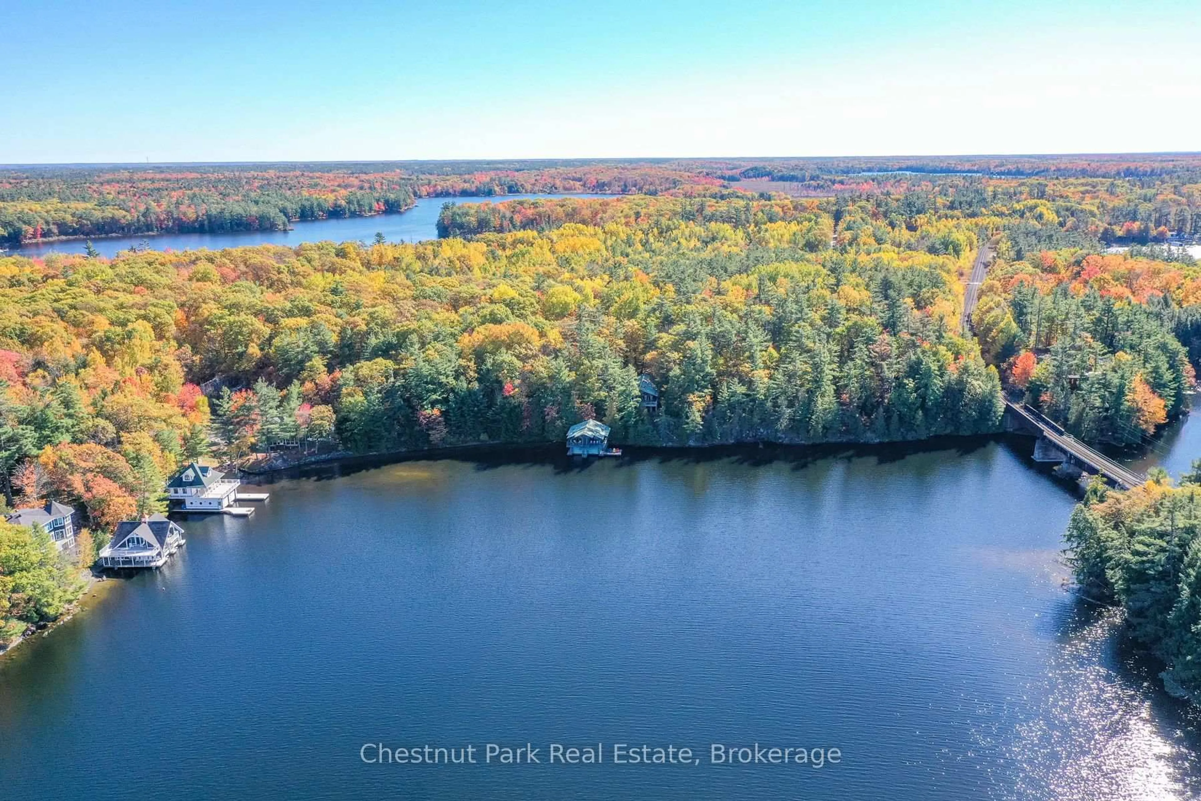 A pic from outside/outdoor area/front of a property/back of a property/a pic from drone, water/lake/river/ocean view for 1024 Neals Rd, Muskoka Lakes Ontario P0C 1M0