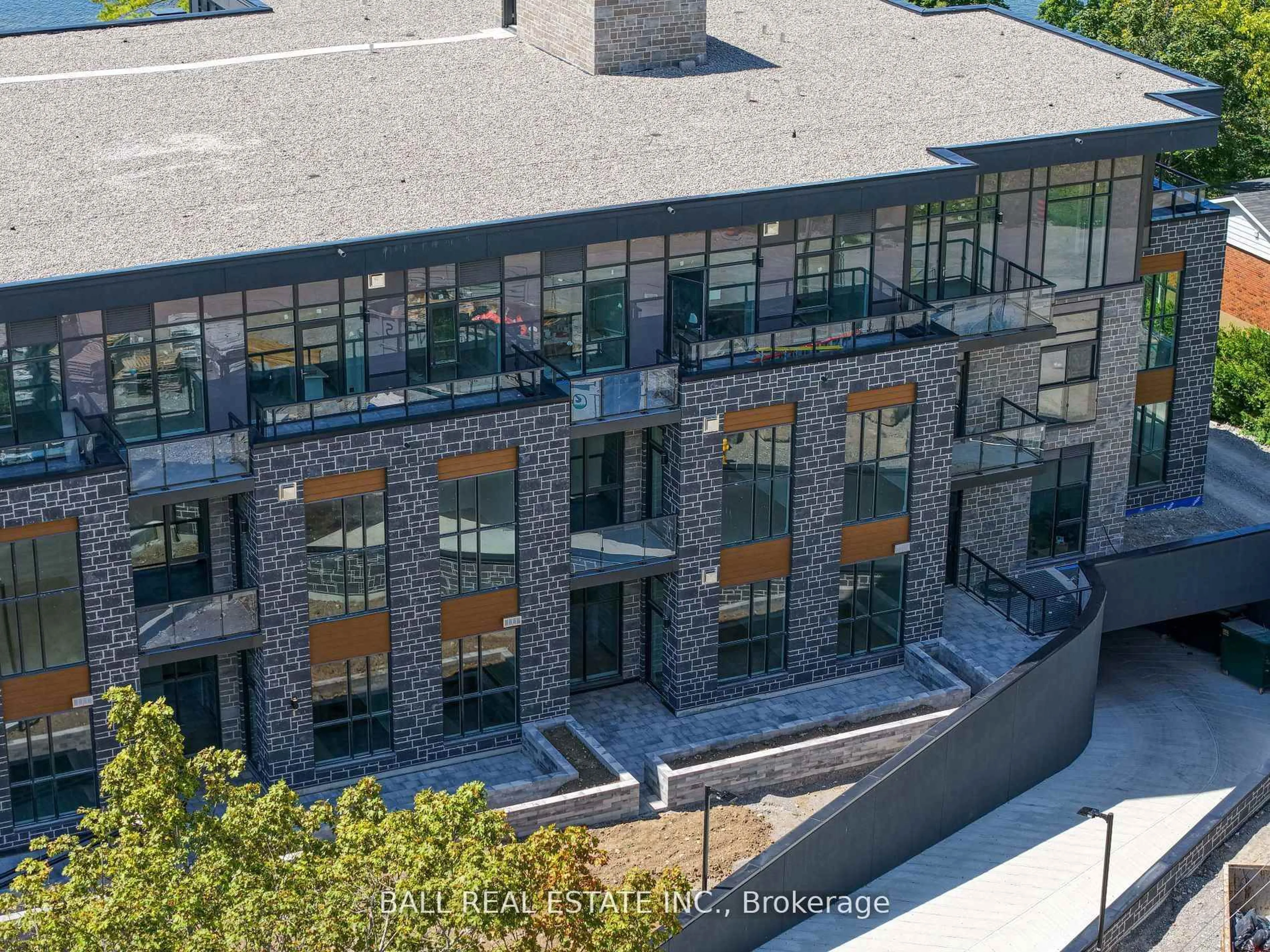 A pic from outside/outdoor area/front of a property/back of a property/a pic from drone, unknown for 99 Louisa St #108, Kawartha Lakes Ontario K0M 1N0